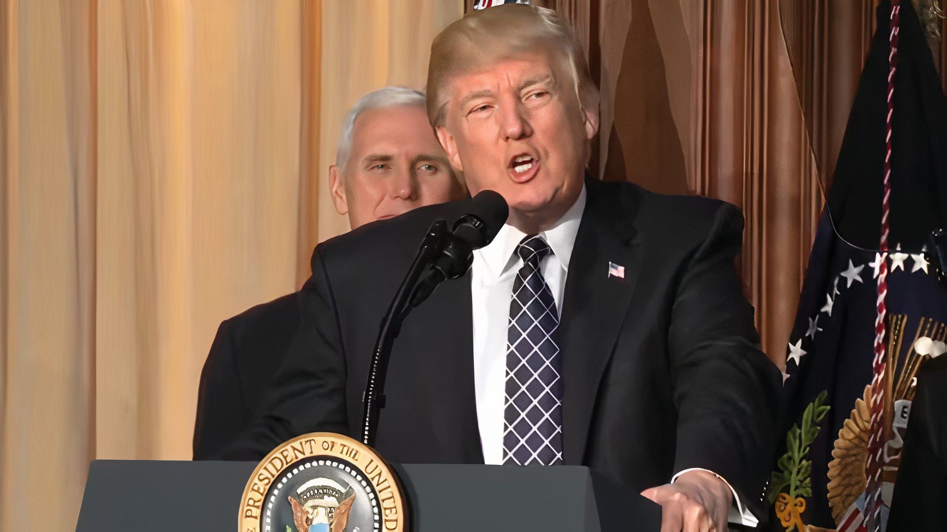 Donald Trump addressing crowd at conference