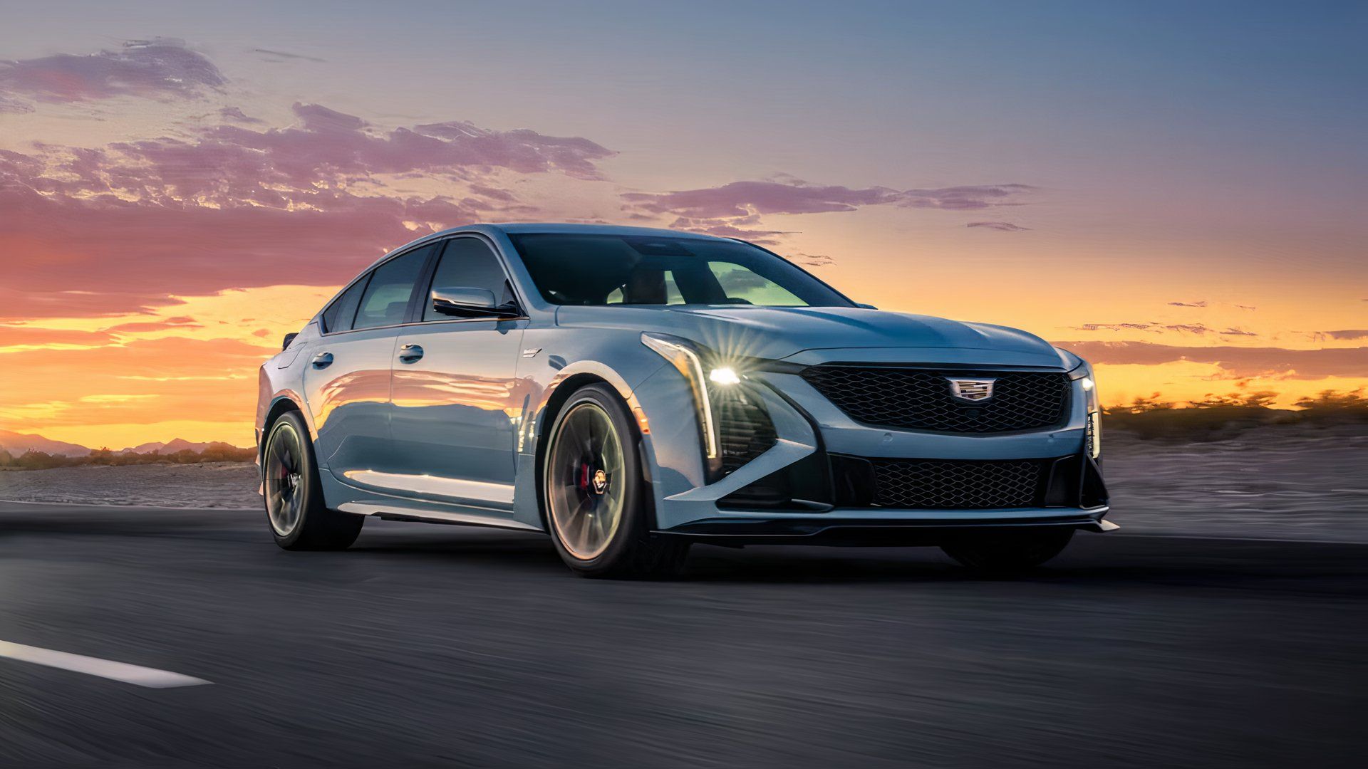 2025 Cadillac CT5-V Blackwing in blue driving on road