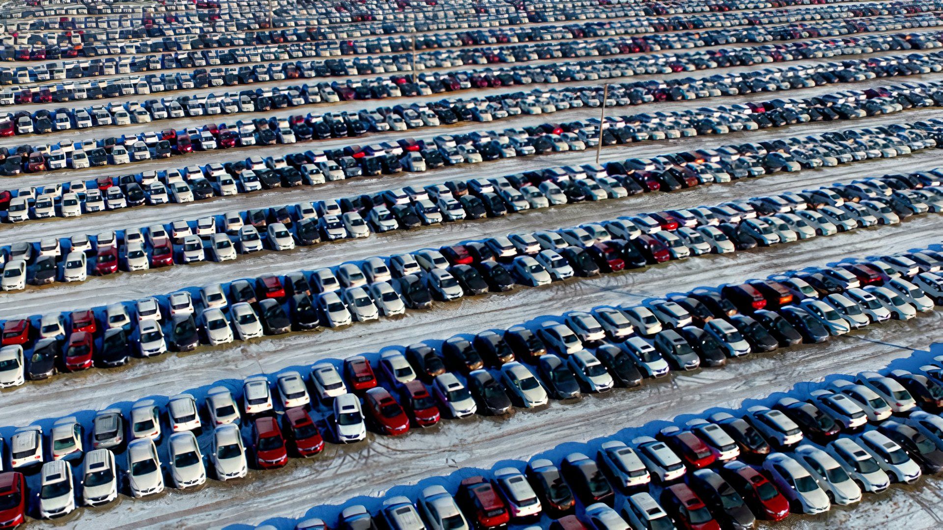 Car lot, view of hundreds of cars from above
