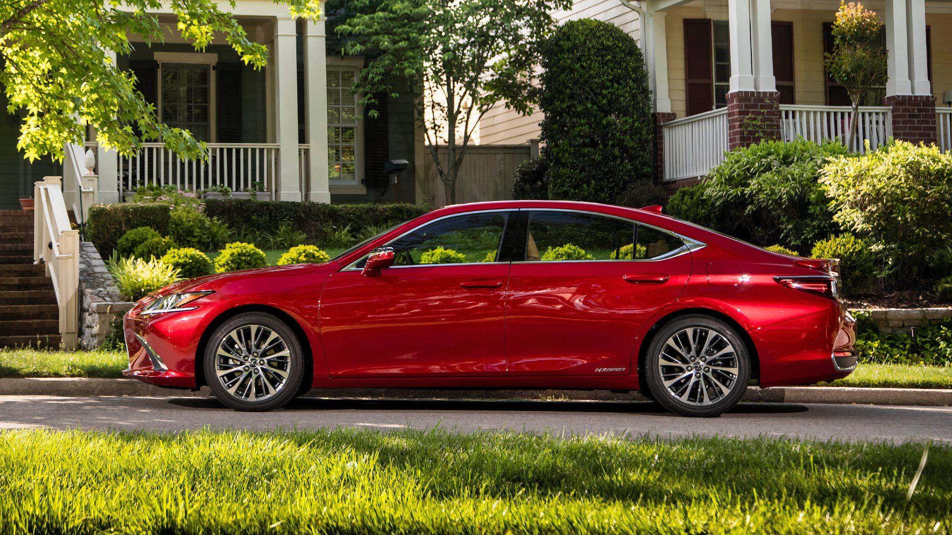 Side profile shot of a red 2019 Lexus ES 300h