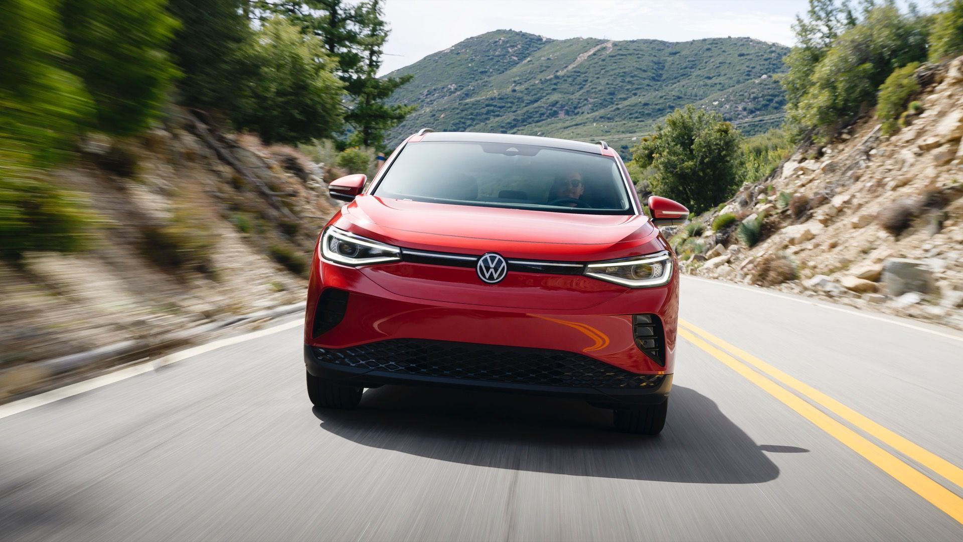 2024 Volkswagen ID.4 in red, front driving shot