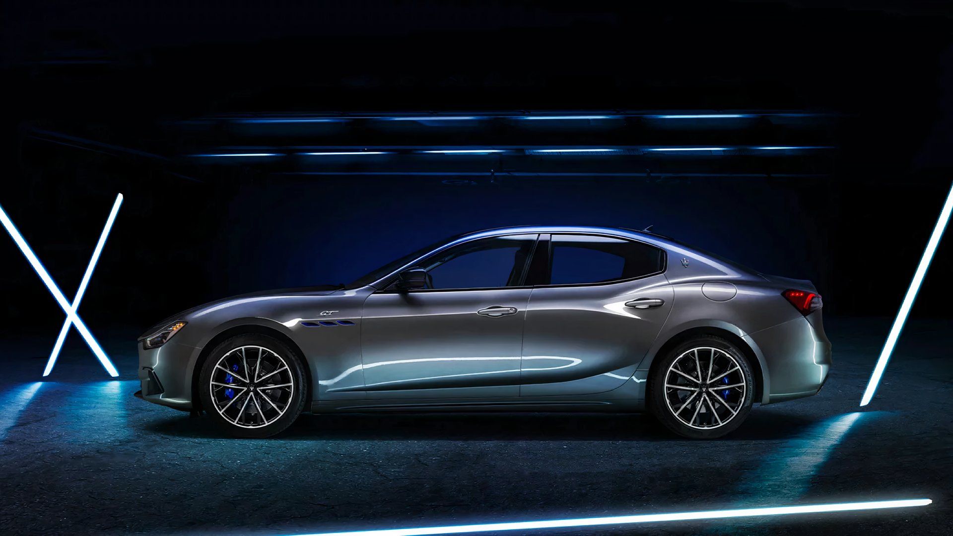 Maserati Ghibli GT Ultima Hybrid in gray parked in a studio
