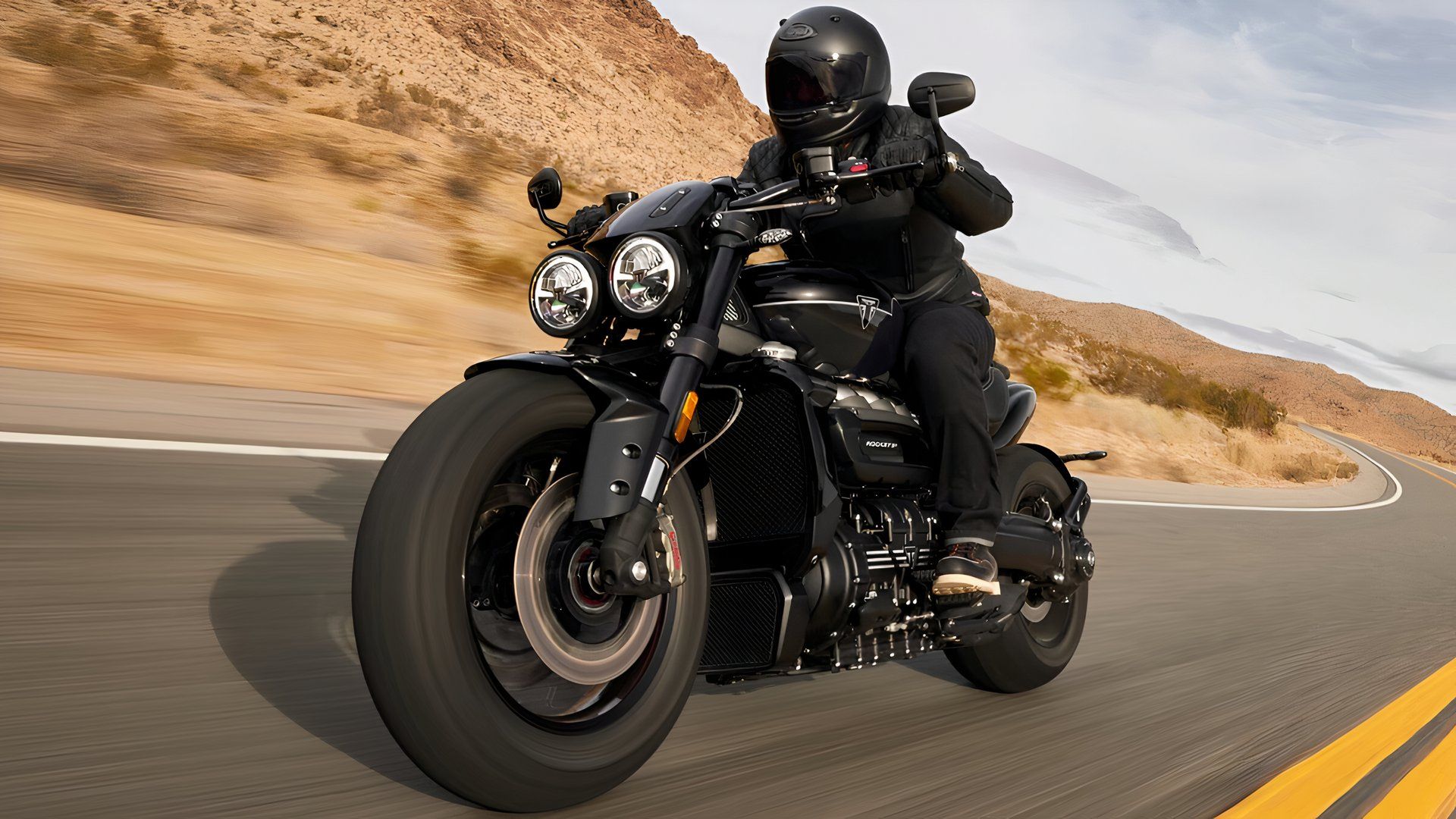 2025 Triumph Rocket 3 Storm accelerating front third quarter view