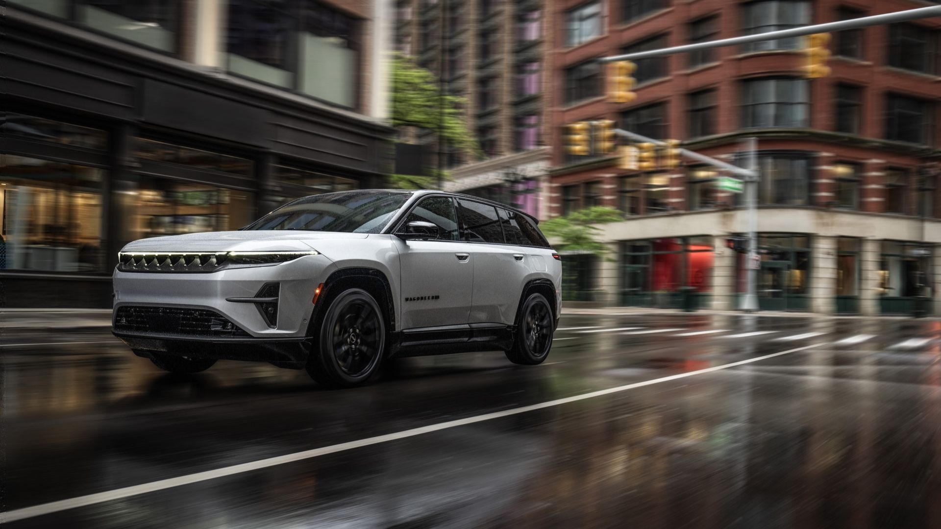 Front 3/4 action shot of a 2024 Jeep Wagoneer S