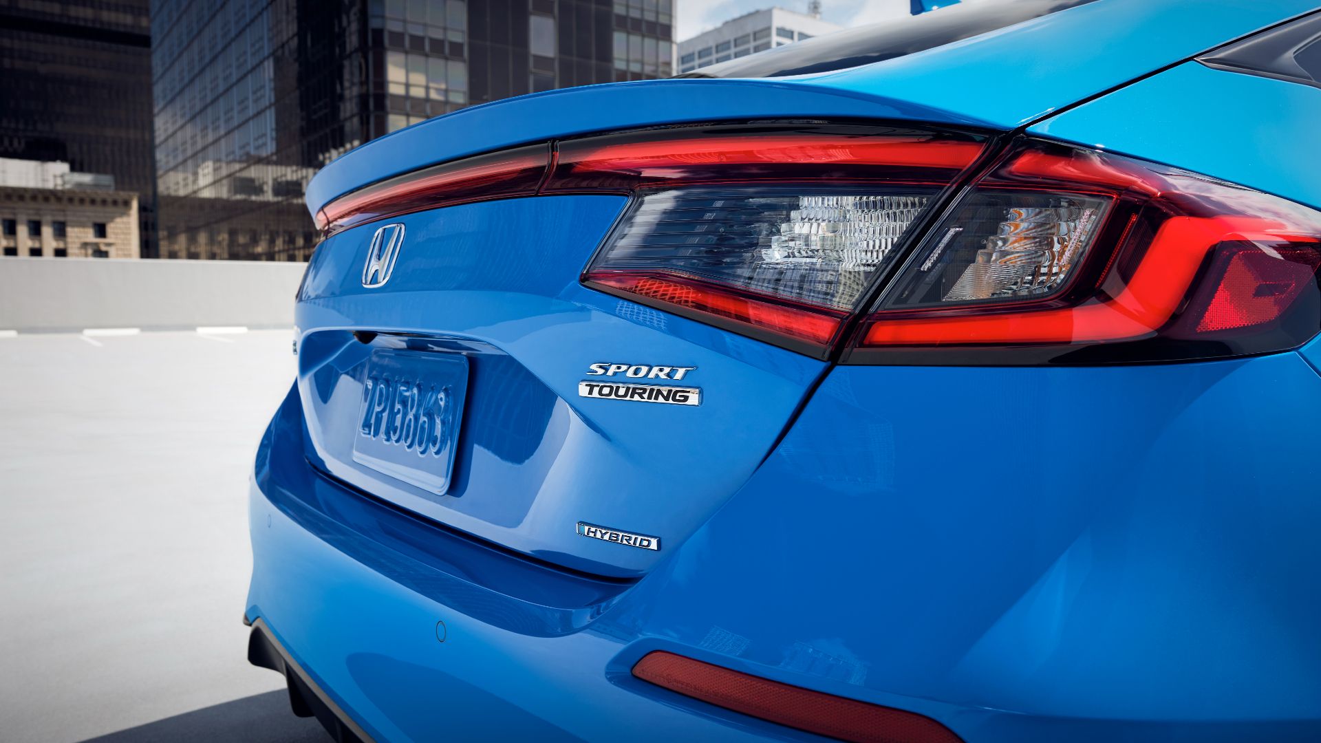 2025 Honda Civic Hatchback Sport Touring Hybrid Rear Exterior Close Up Of Taillights And Trunk