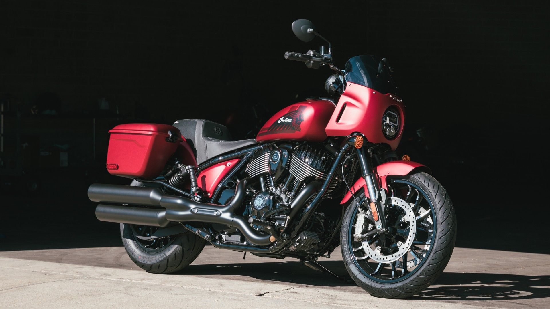 Stock 2025 Indian Sport Chief RT in red front third quarter view
