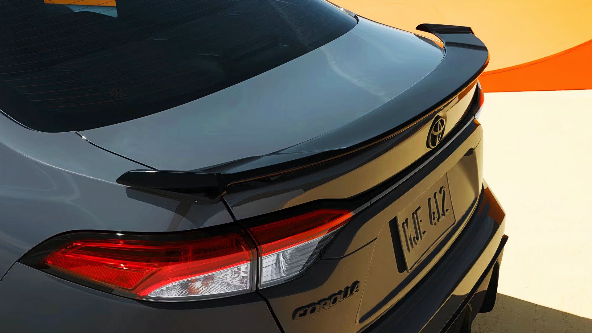 A gray 2025 Toyota Corolla Hybrid's rear.