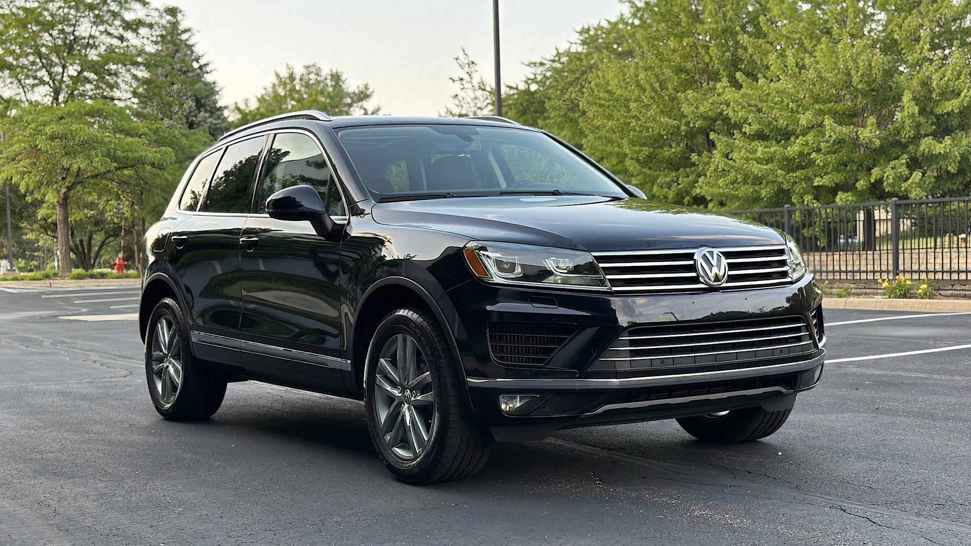 2015 Volkswagen Touareg TDI Lux in black parked in parking lot