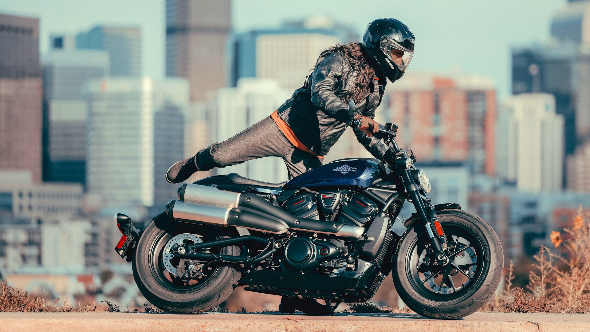 Rider mounting a 2025 Harley-Davidson Sportster S