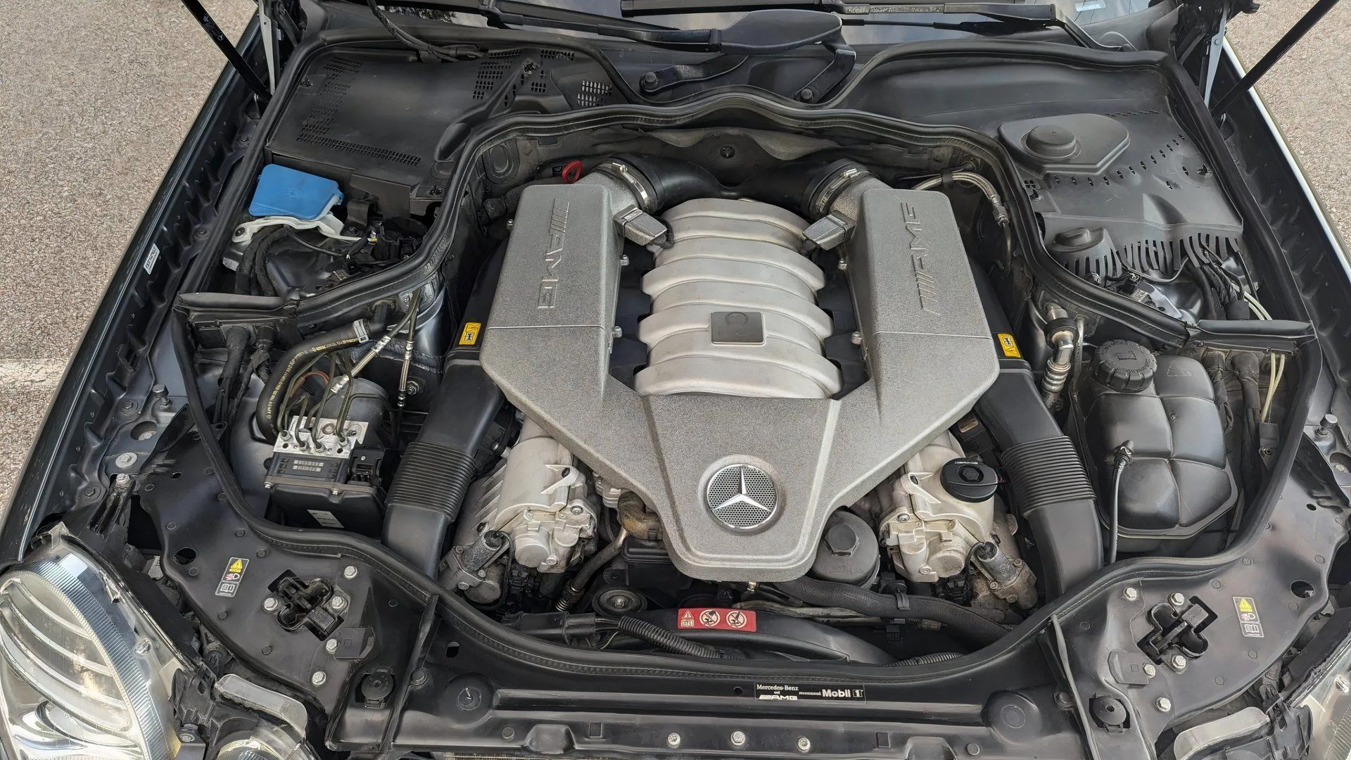 The engine of a 2008 Mercedes-AMG E63