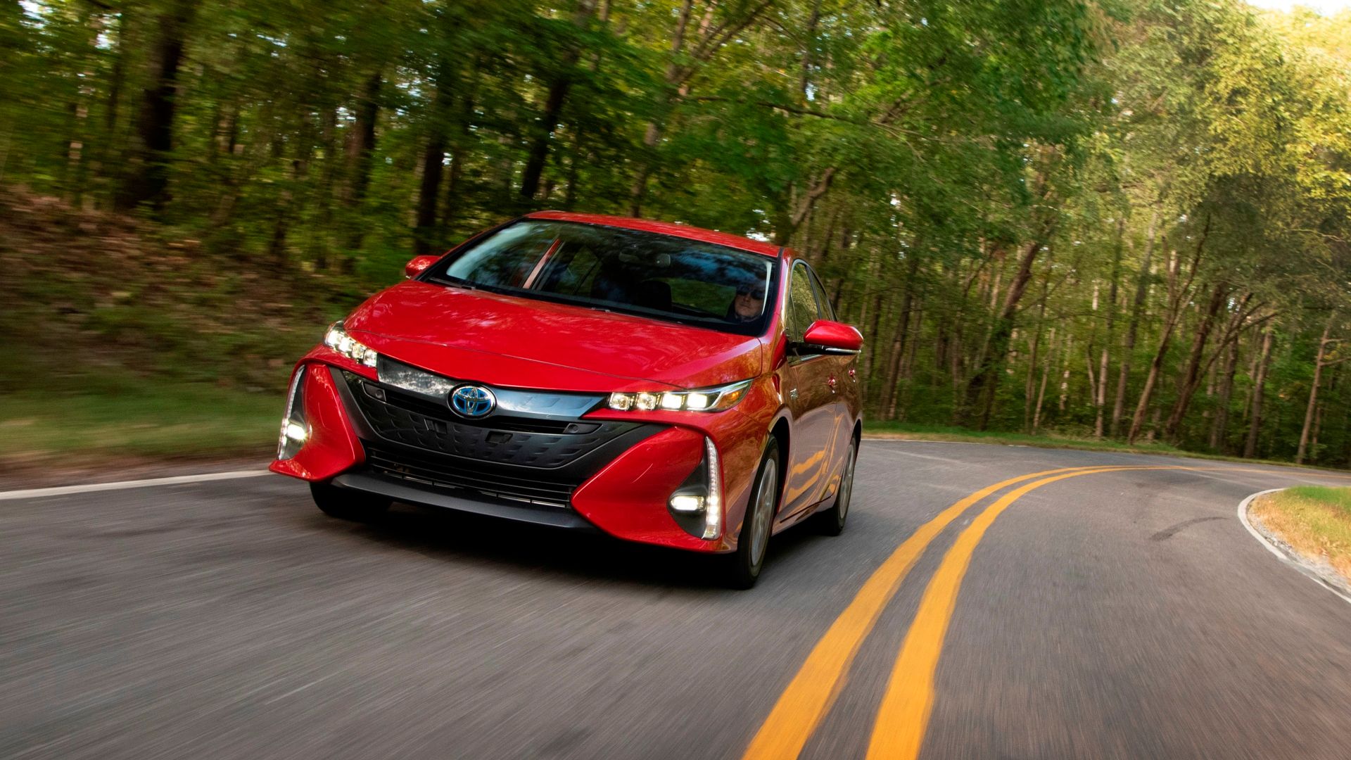Red Prius Prime front-quarter