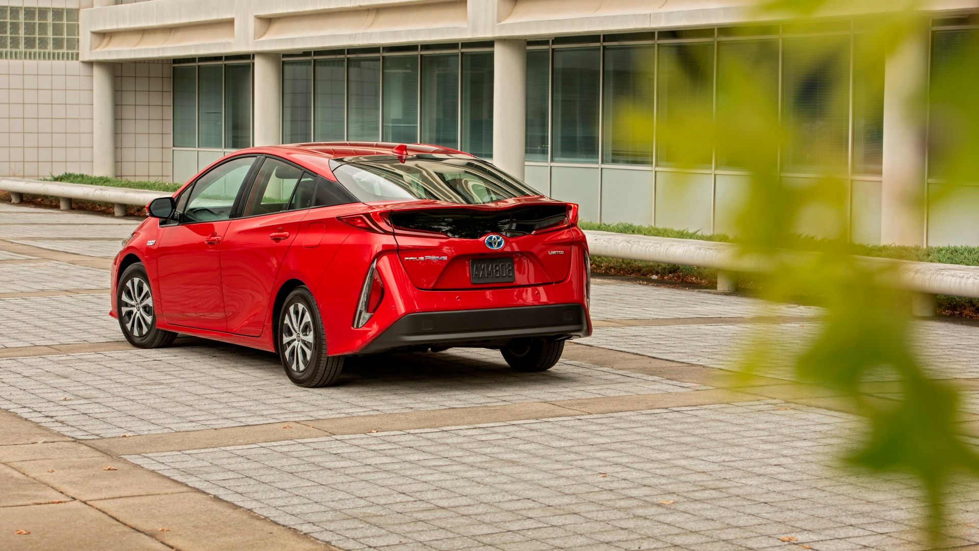 Red Prius Prime rear-quarter