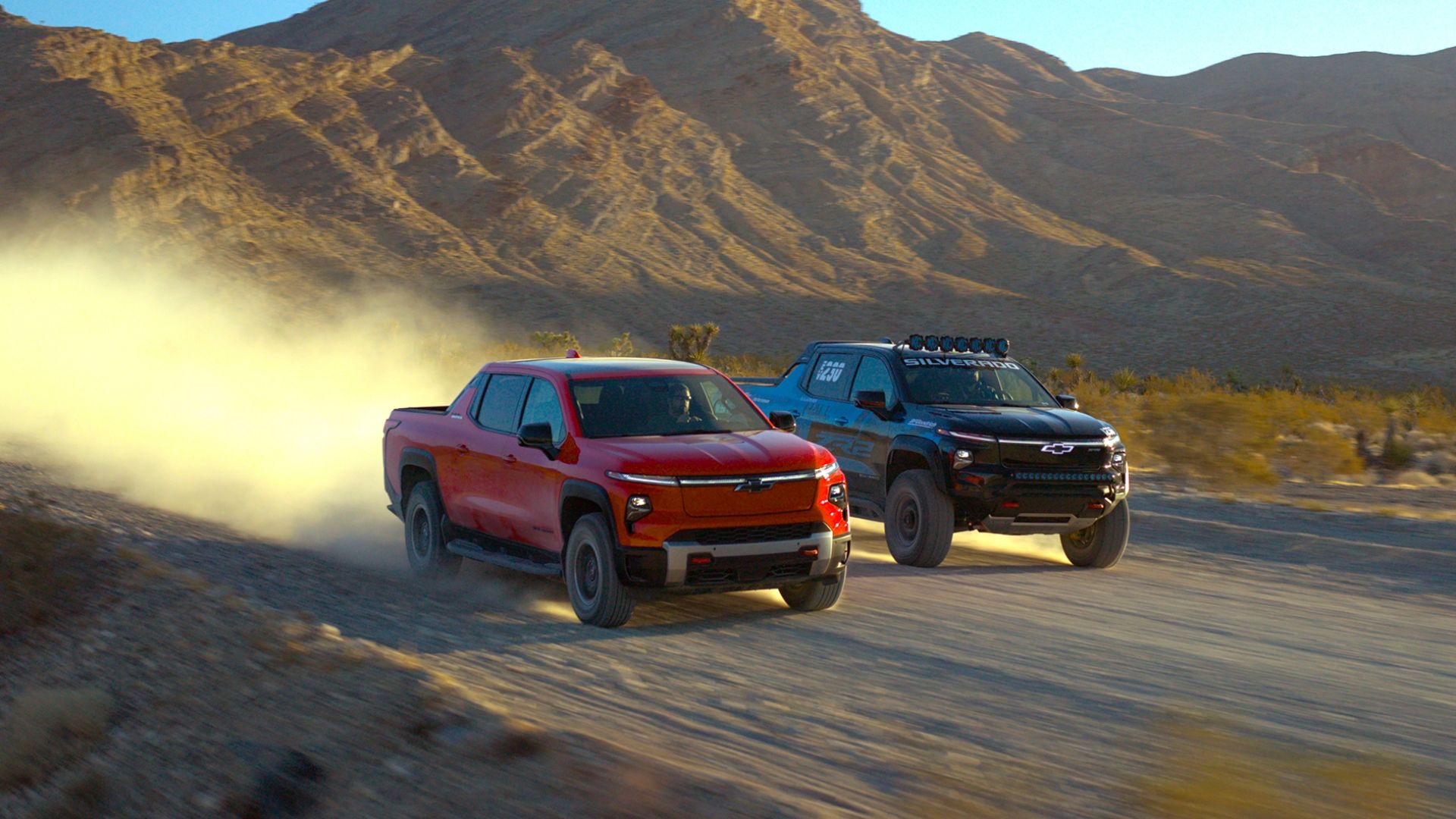 Chevrolet Silverado EV ZR2 Off-Road Race Truck Concept Front Three-Quarter Driving Duet