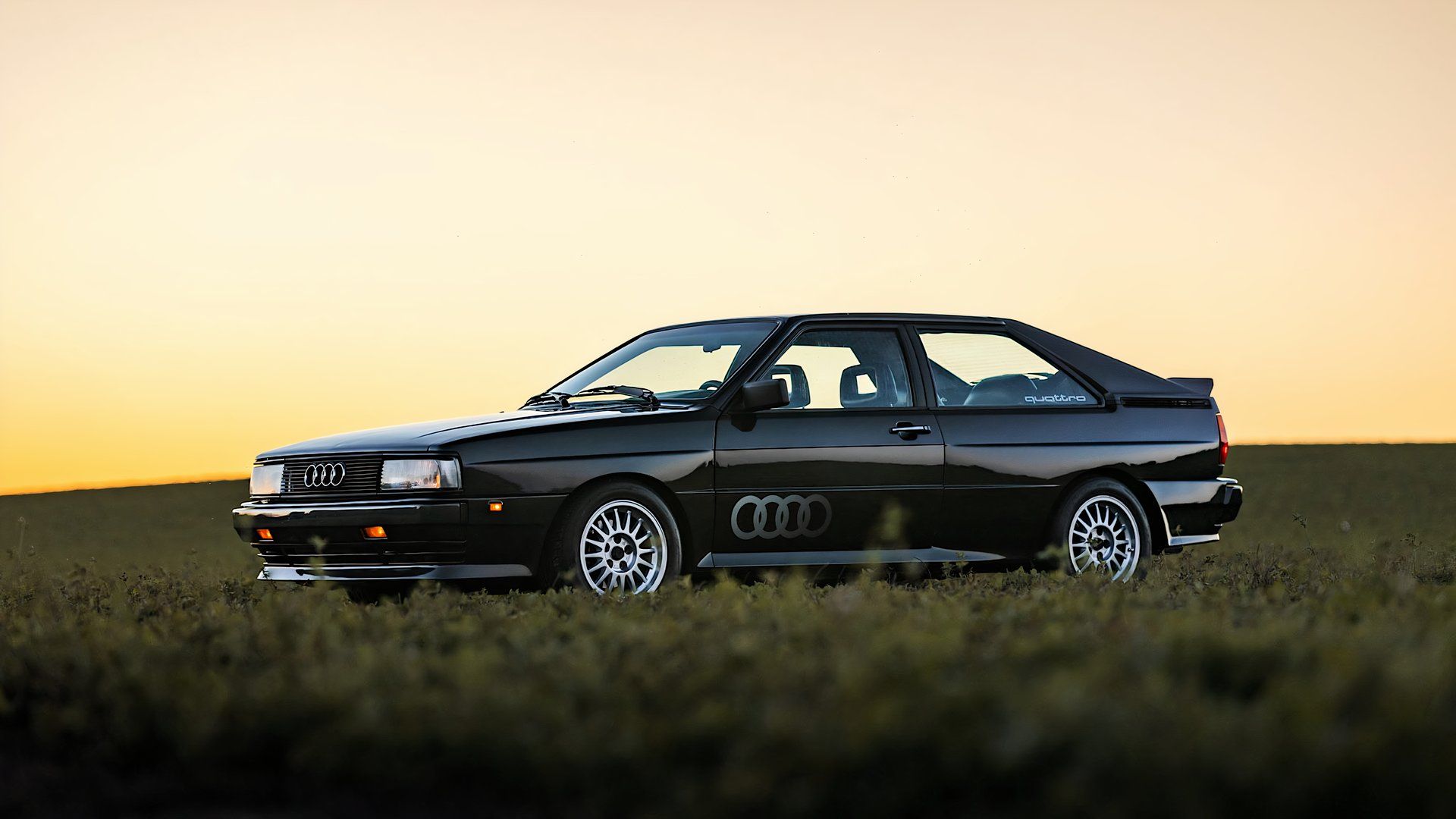 1985 Audi Quattro 20V in black parked in field