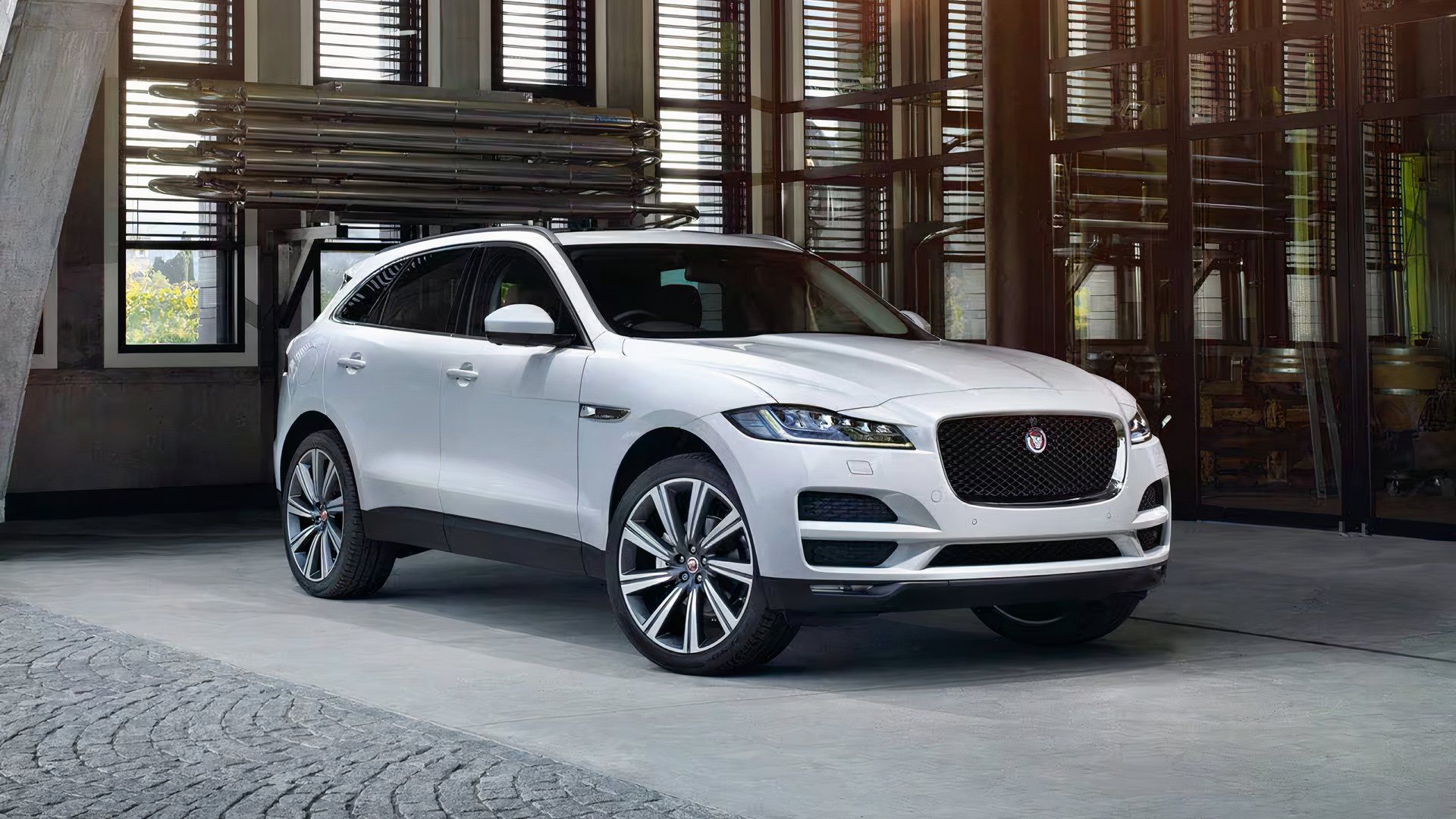2019 Jaguar F-PACE 20d Prestige in white parked inside