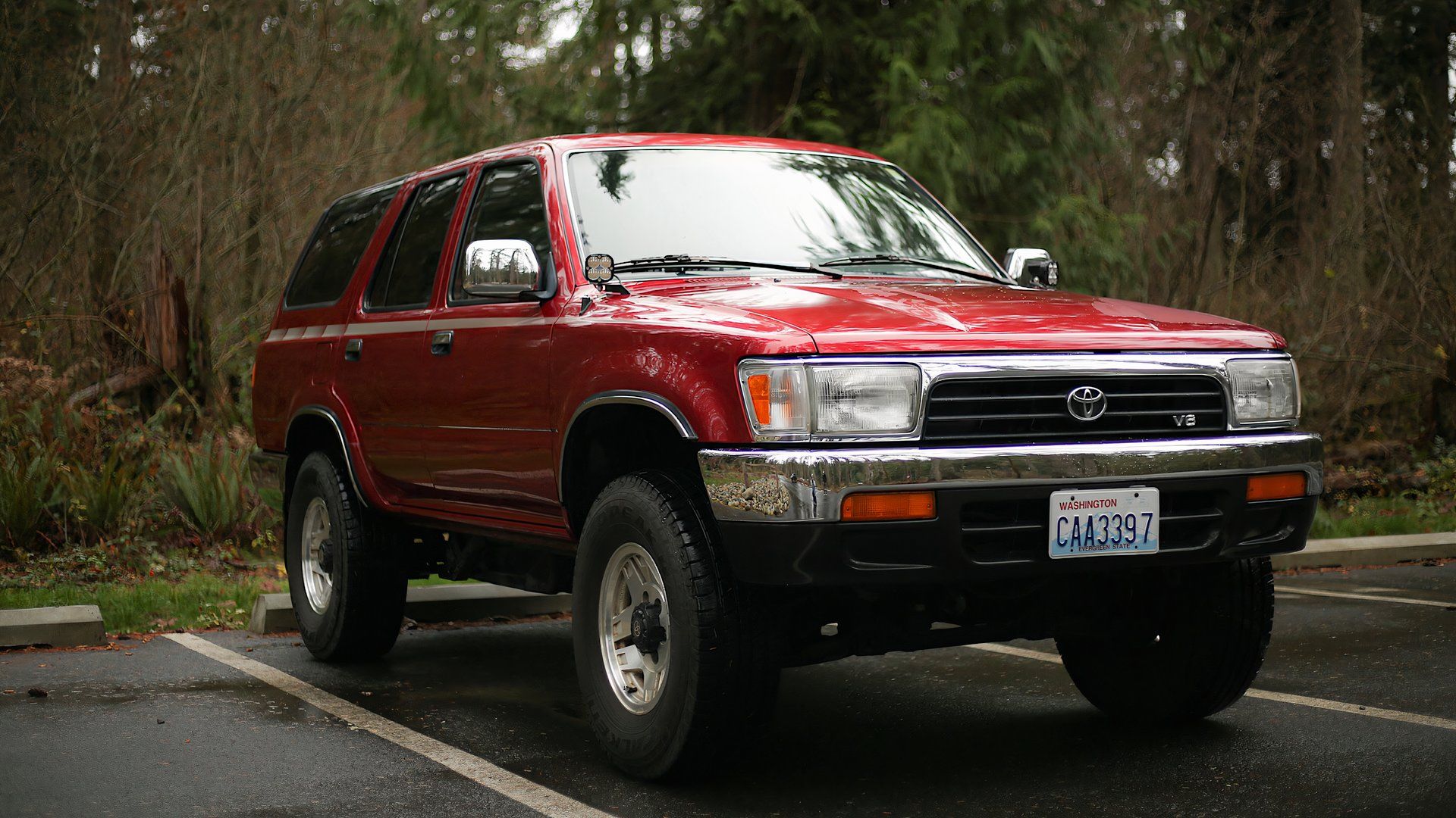 1992 Toyota 4Runner SR5 V6 in red parked in parking lot