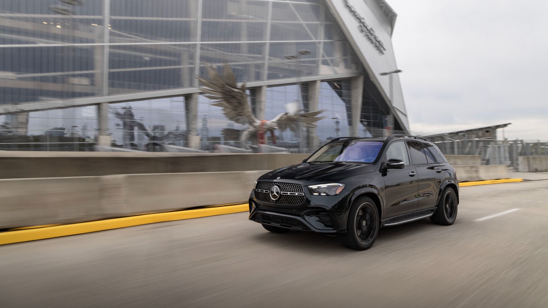 2024 Mercedes GLE 450 Exterior Driving Down Road