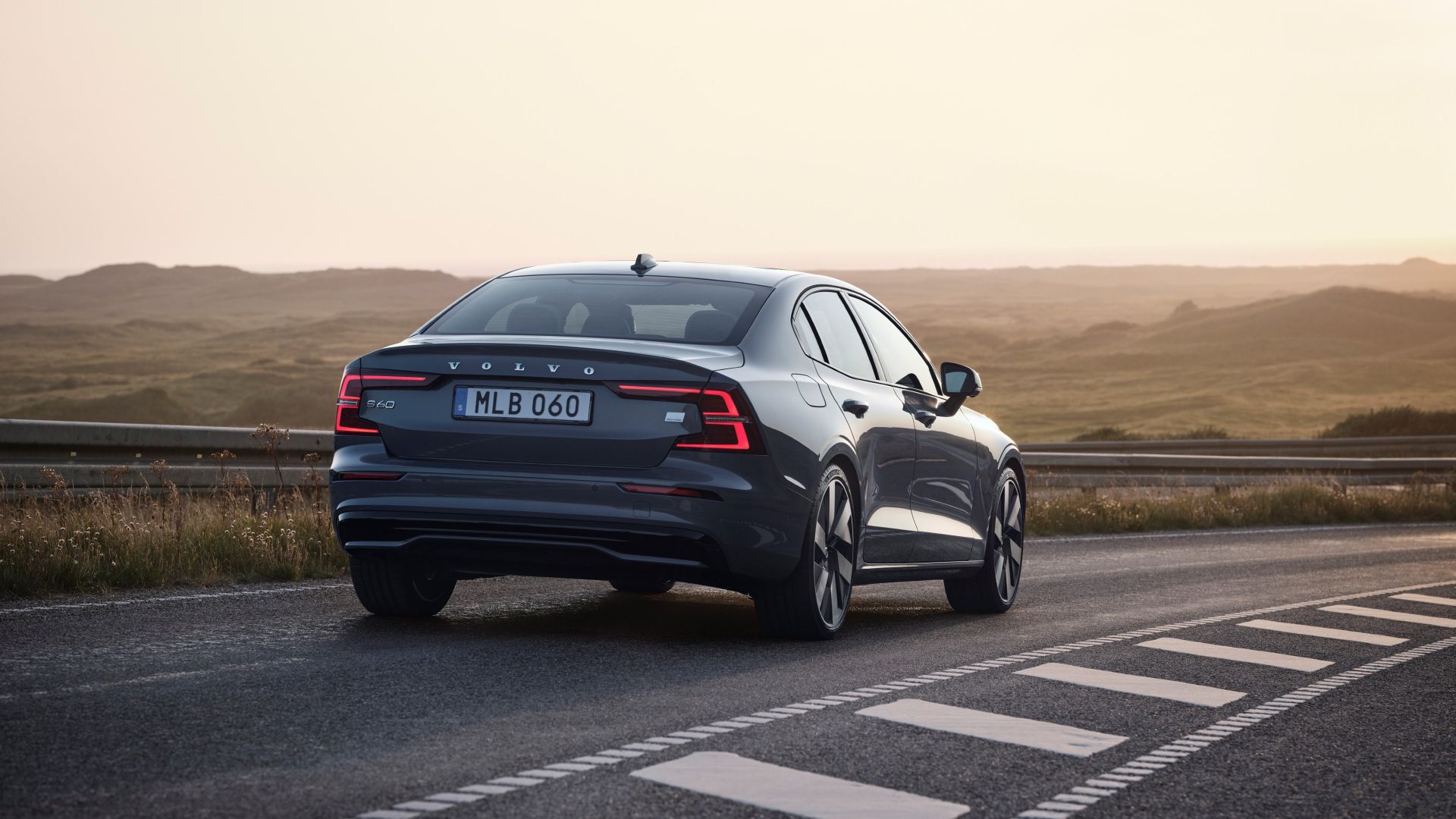 2025 Volvo S60 T8 Exterior Rear Driving