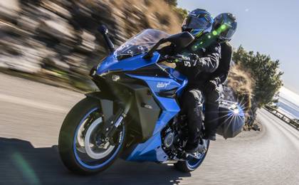 2025 Suzuki GSX-S1000GT+ sports tourer accelerating front third quarter view