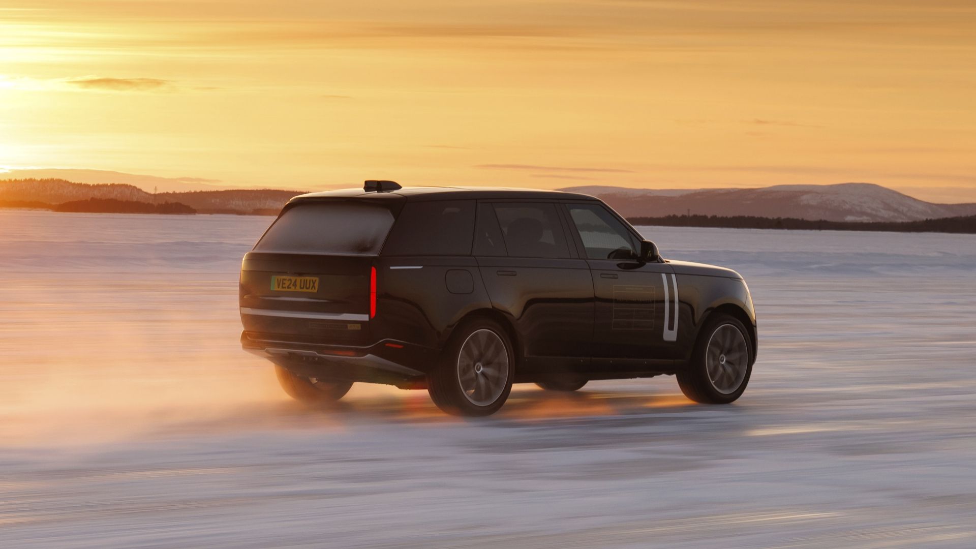 Range Rover Electric Winter Testing Driving In Snow Rear