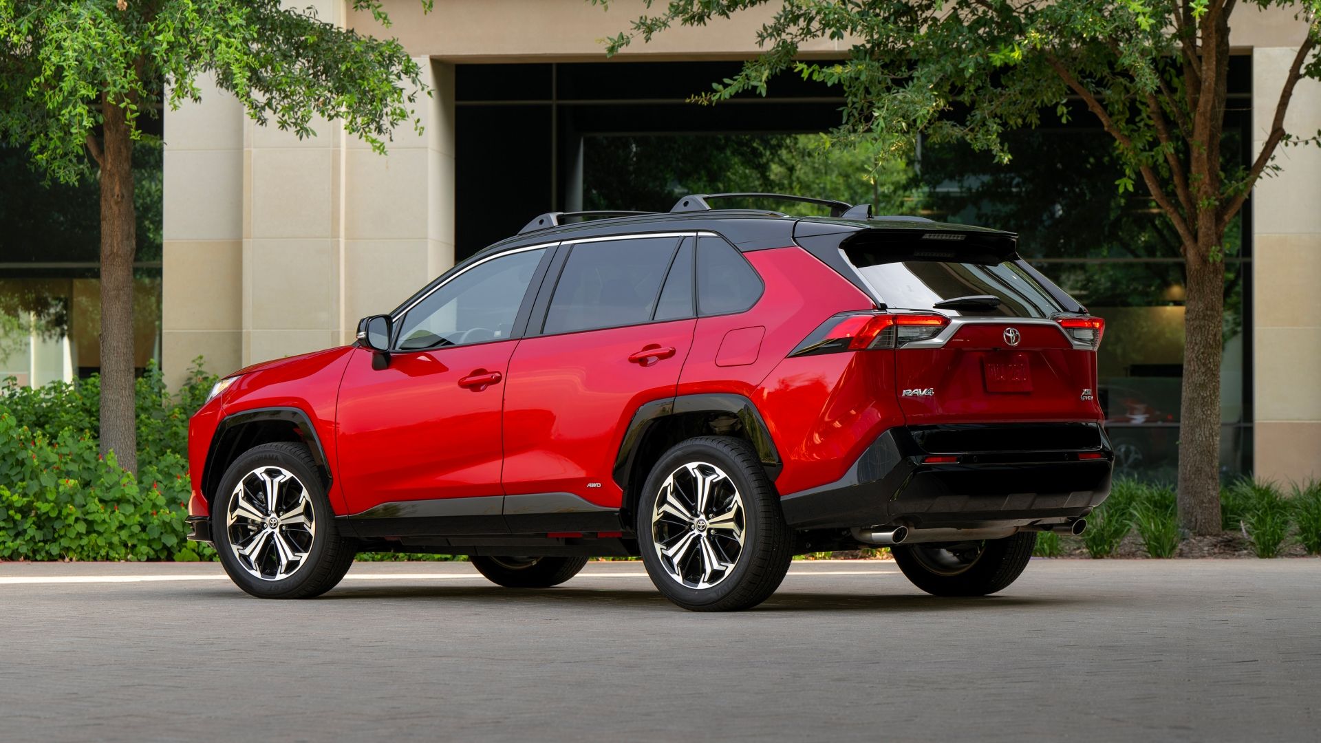 2025 Toyota RAV4 Plug-In Hybrid Red Rear Three-Quarter 02