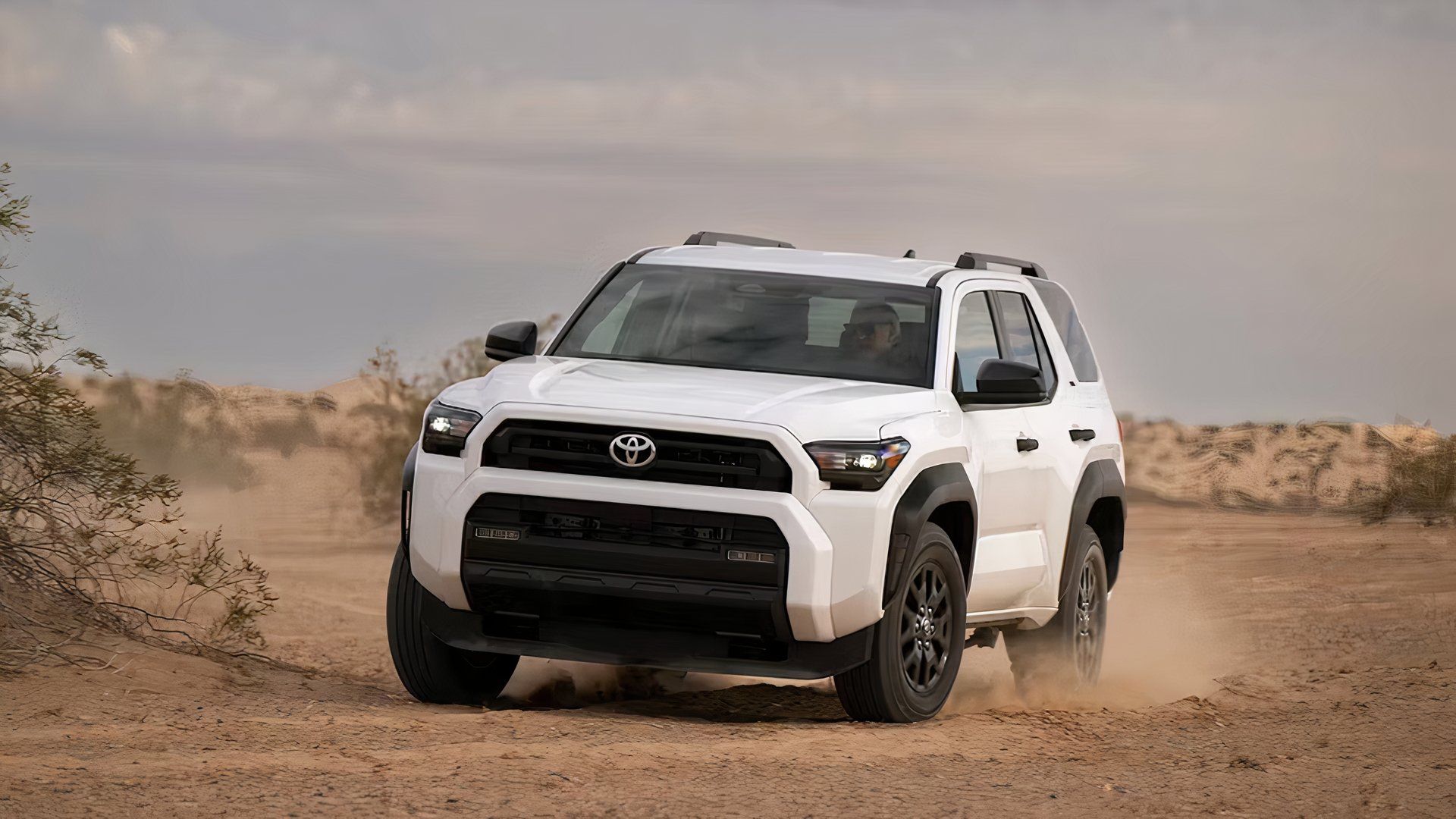 2025 Toyota 4Runner SR5 in white driving off-road