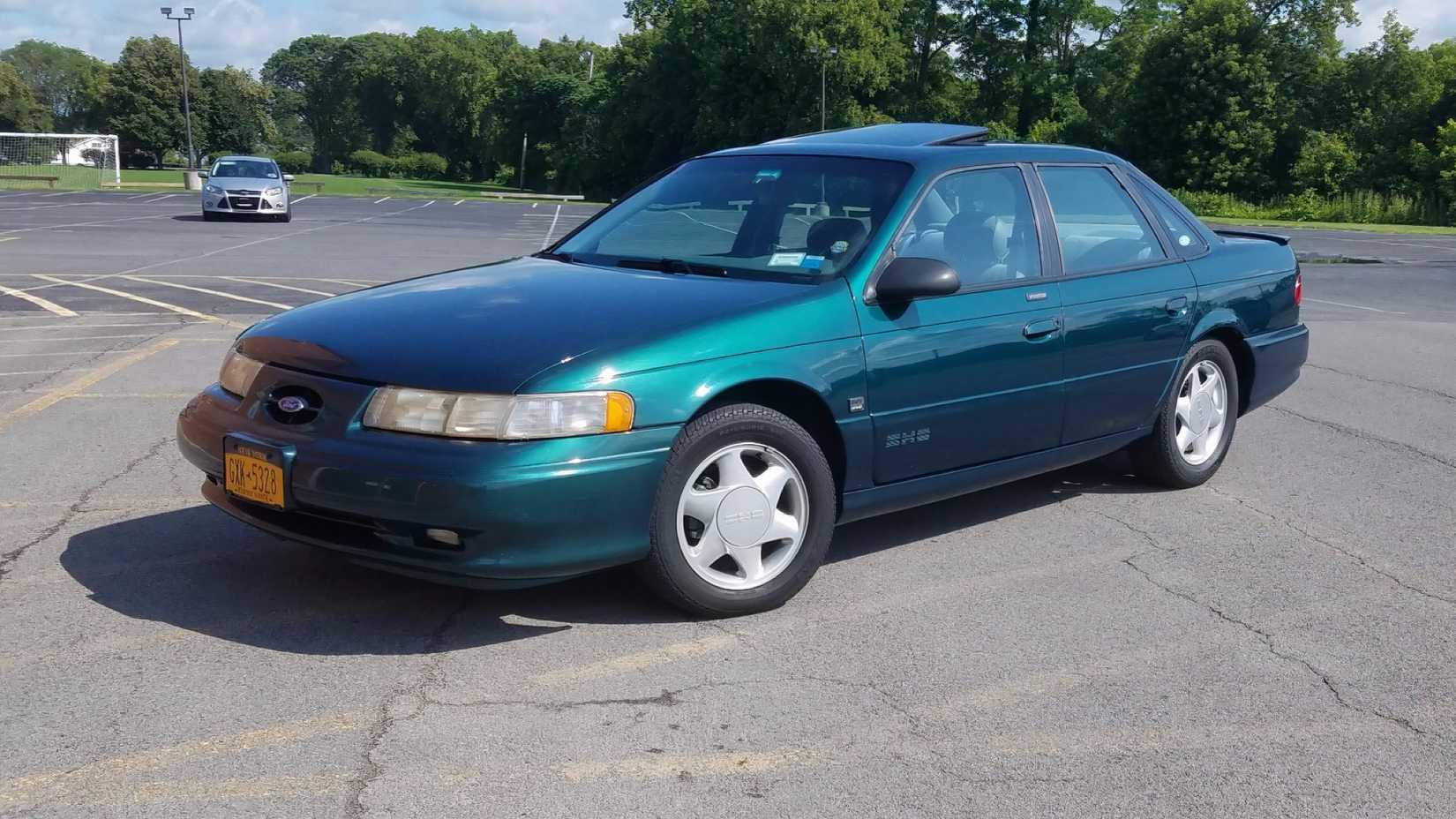 1994 Ford Taurus Sho parked in Blue in the parking lot