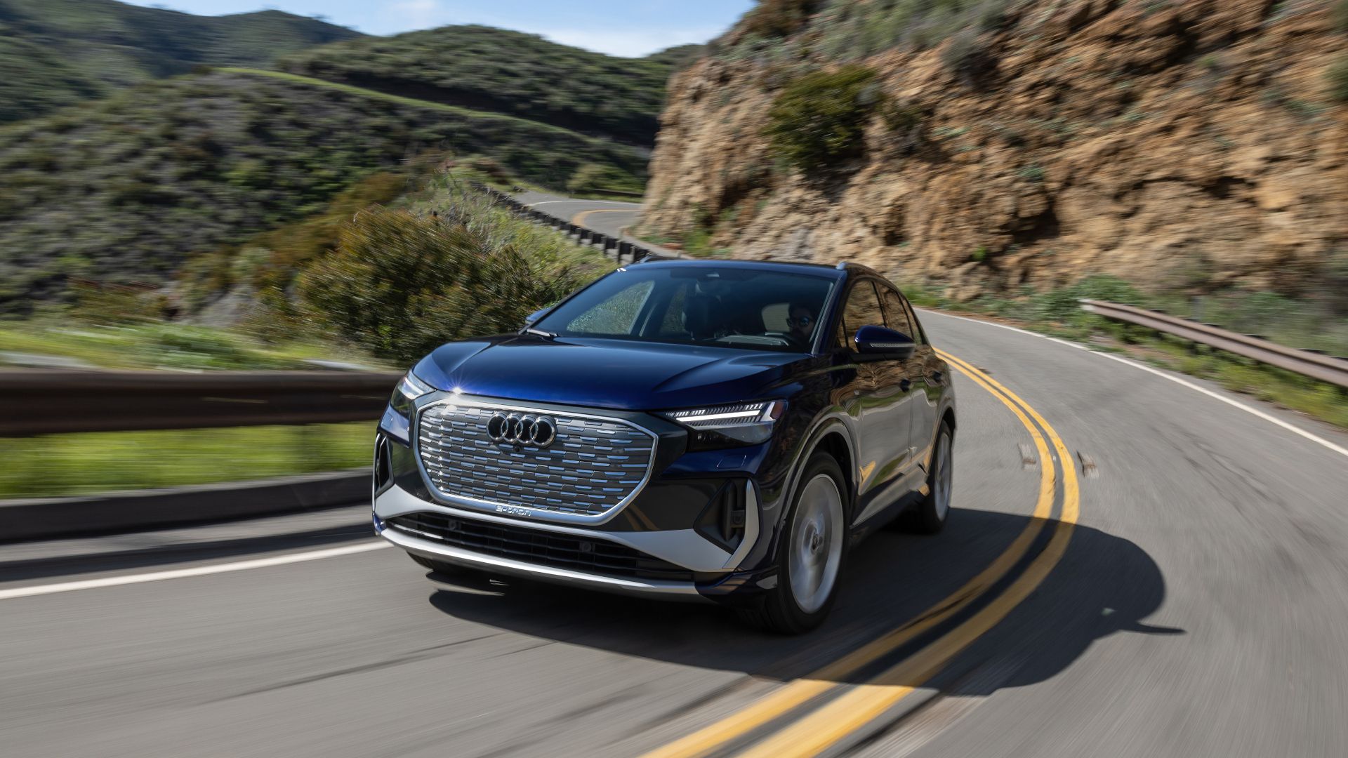 2023 Audi Q4 50 e-tron Exterior Driving Down Road