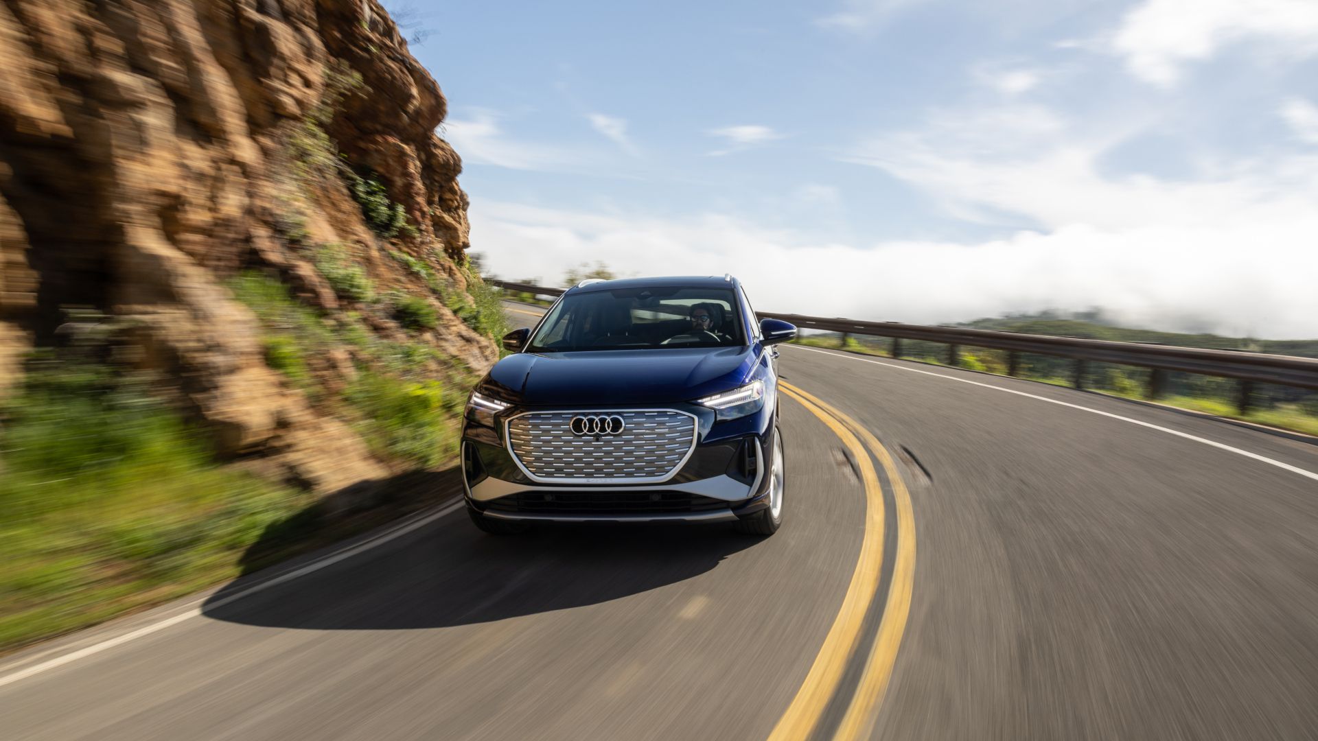 2023 Audi Q4 50 e-tron Exterior Driving Down Road