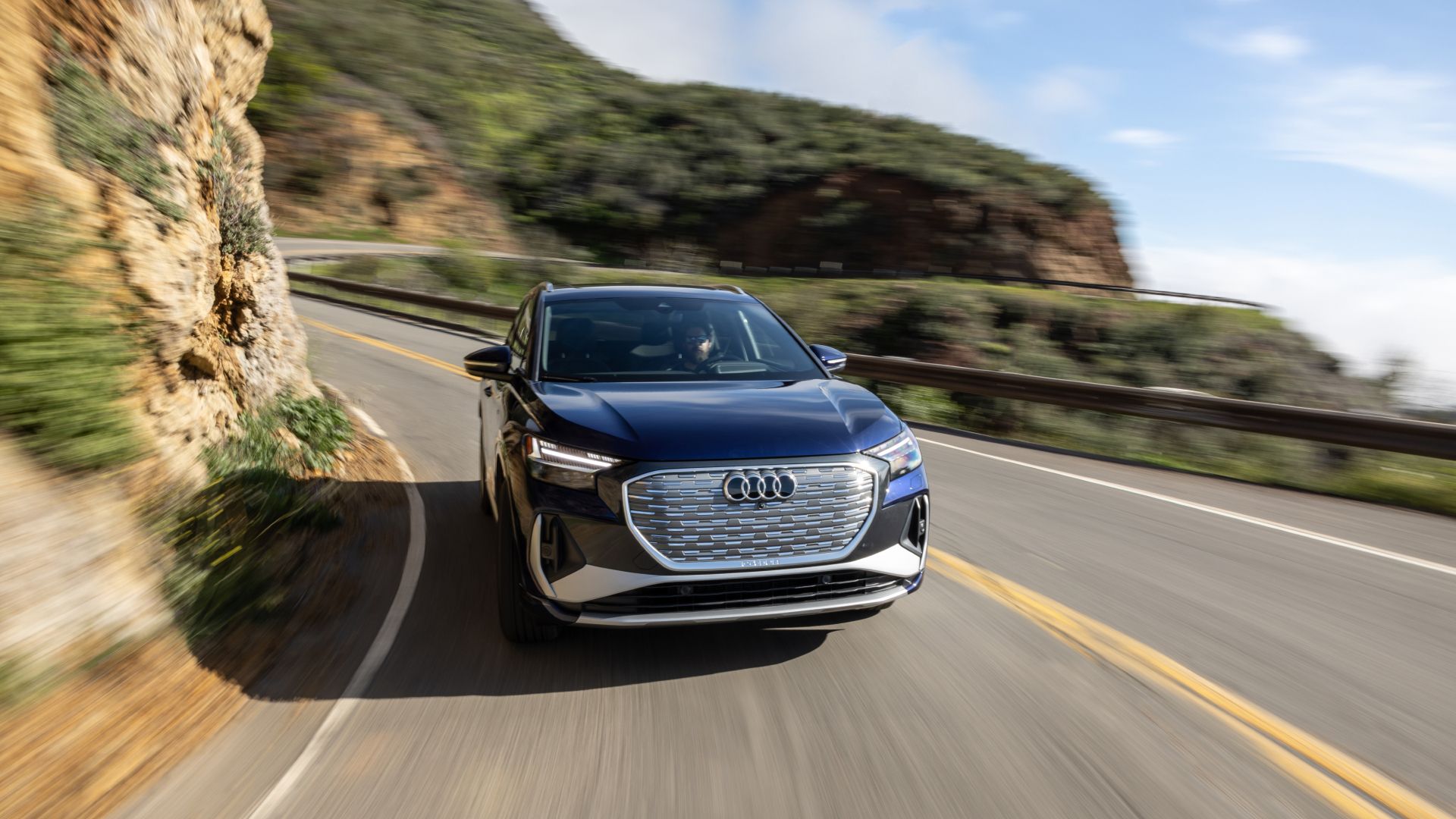 2023 Audi Q4 50 e-tron Exterior Driving Down Road