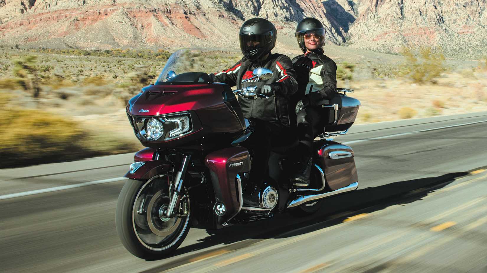Rider and passenger on a 2025 Indian Pursuit Limited