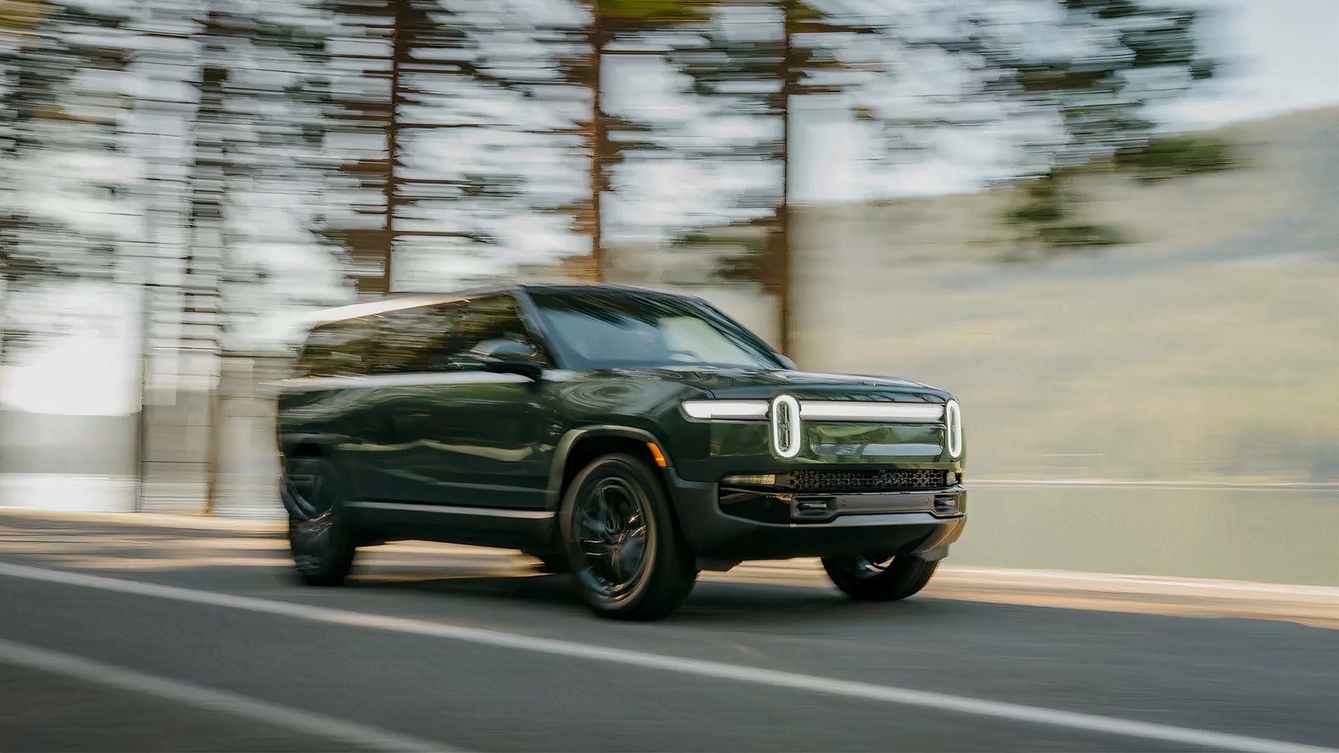 Dynamic shot of the 2026 Rivian R1S Quad