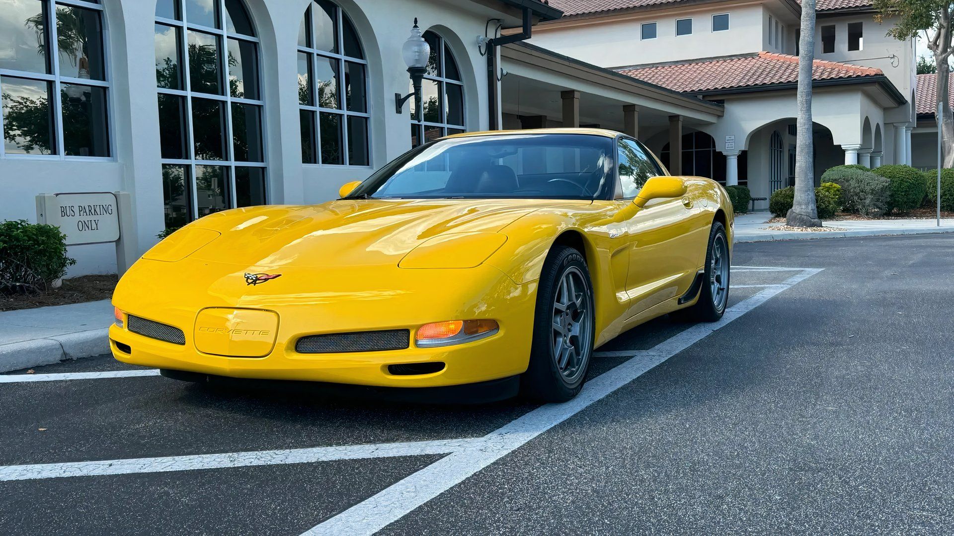2002 Chevrolet Corvette Z06 in yellow parked in parking lot