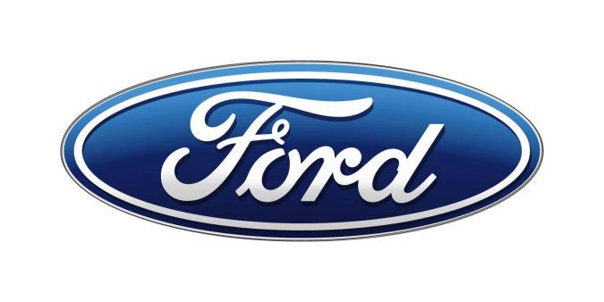 FORD BACKS OFF HYBRIDS