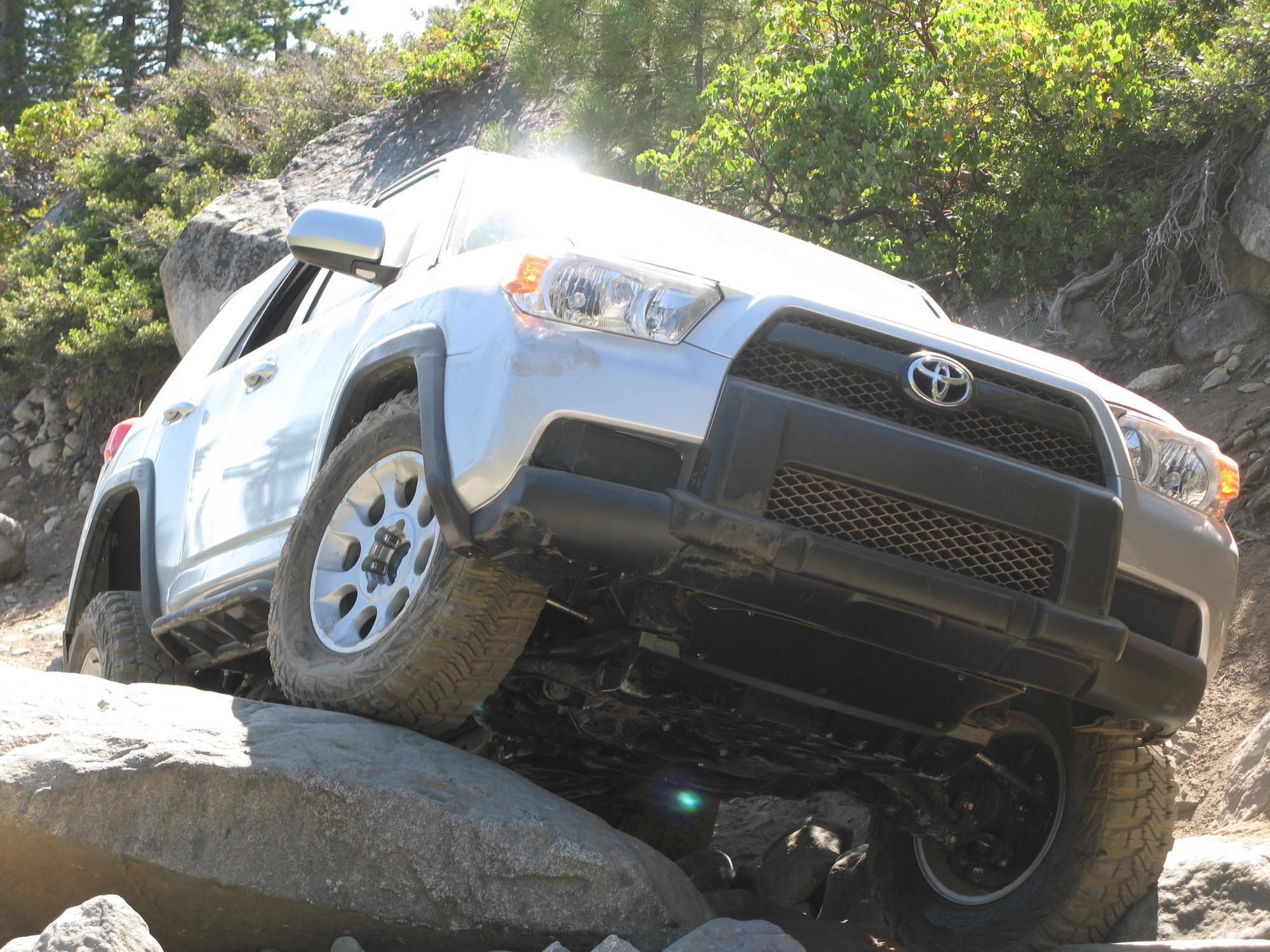 2010 Toyota 4Runner going offroad on a rocky terrain