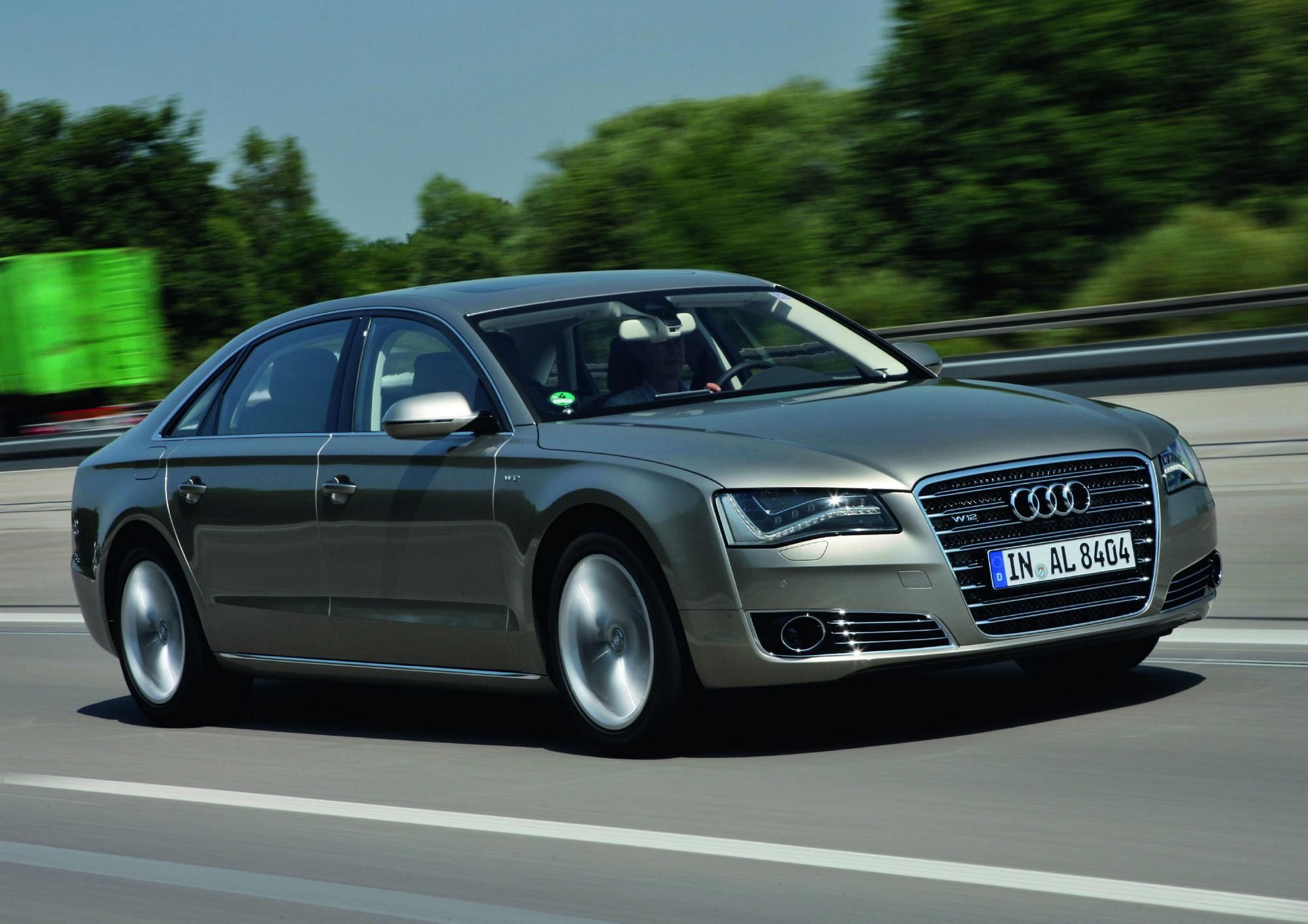 Silver 2012 Audi A8L on a highway