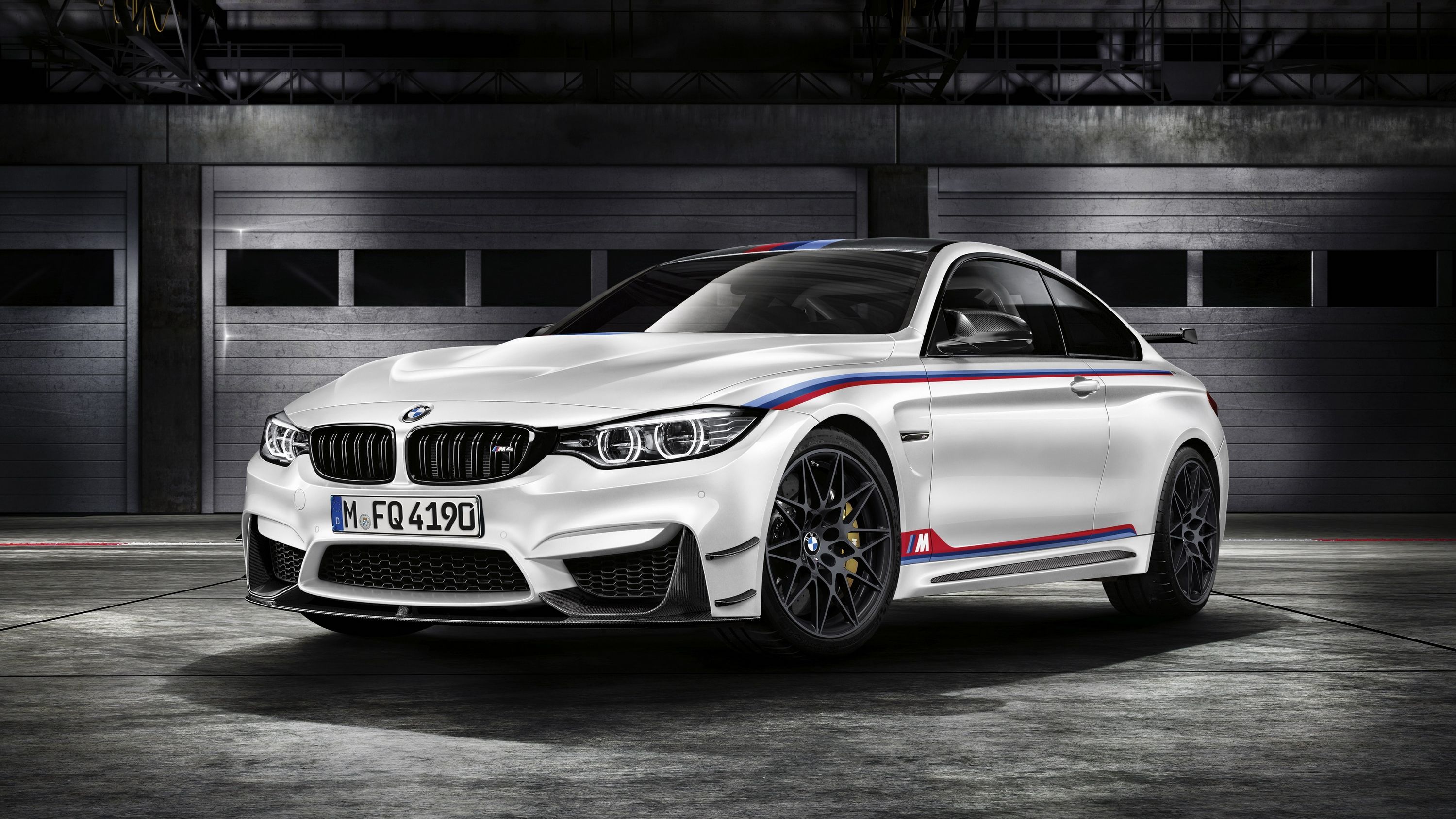 White BMW M4 DTM Champion Edition standing 