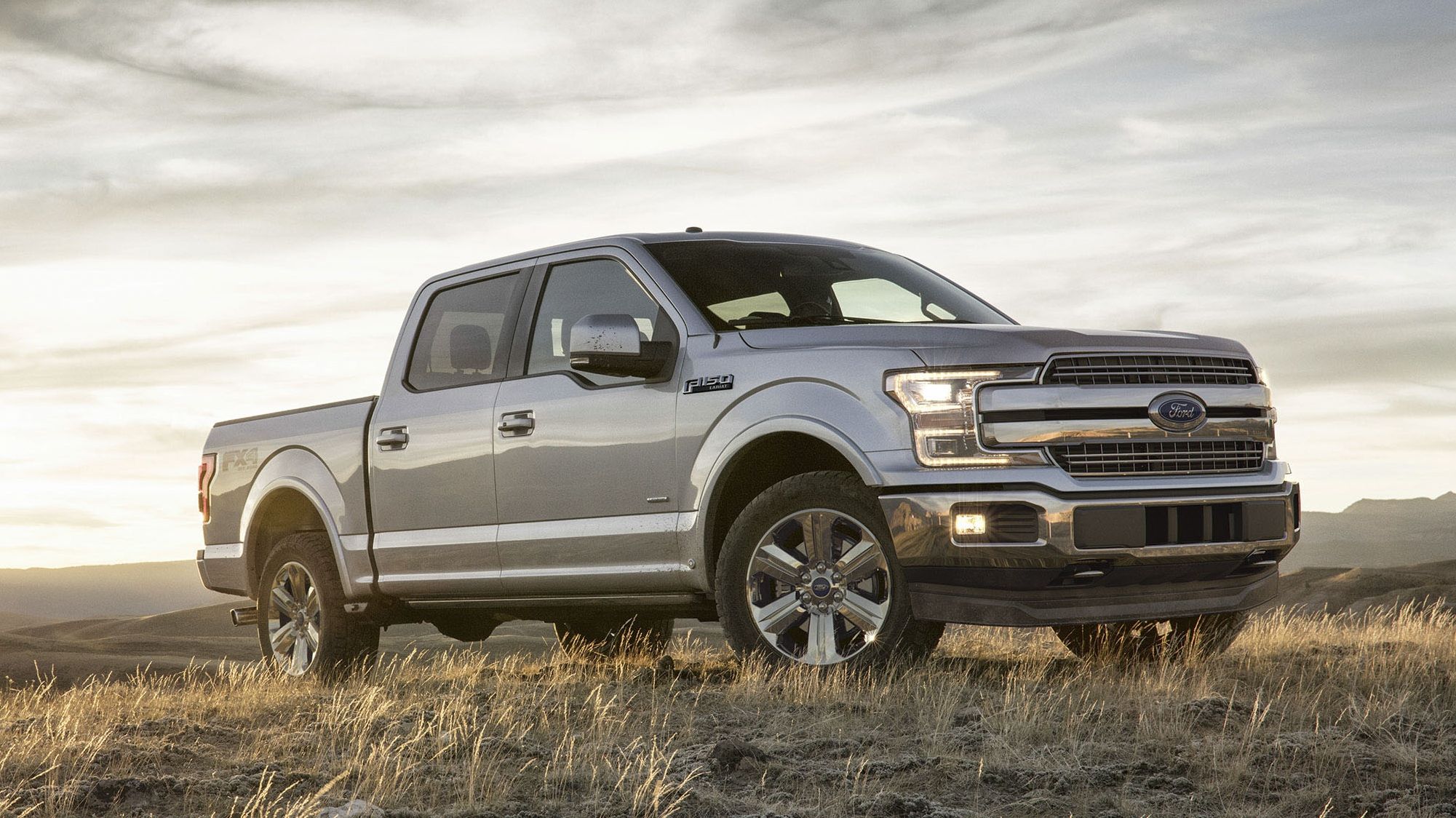 2018 5.0 Liter V-8 Ford F-150 in silver posing on off-road terrain