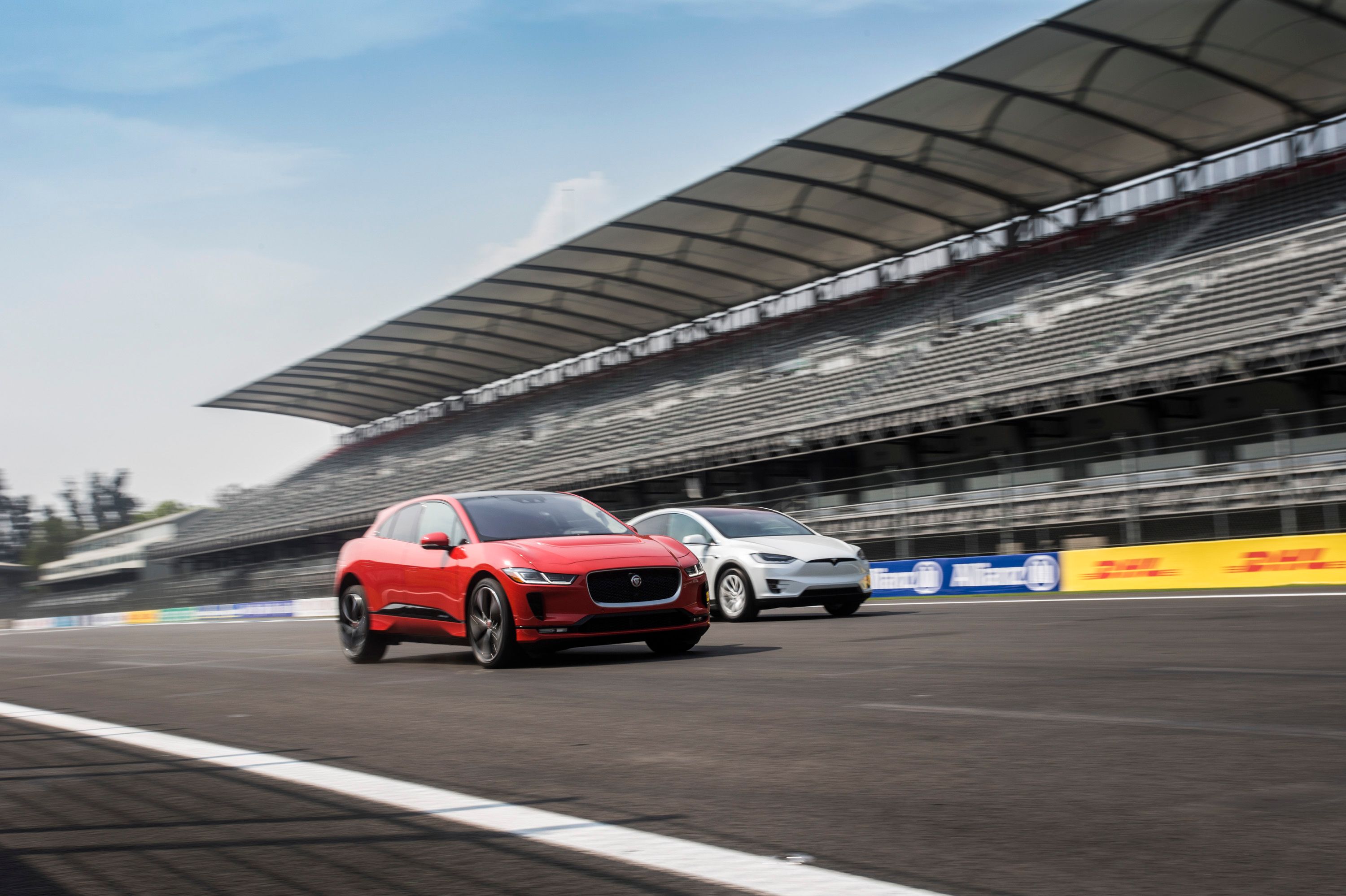 2023 Jaguar I-Pace racing on a track.