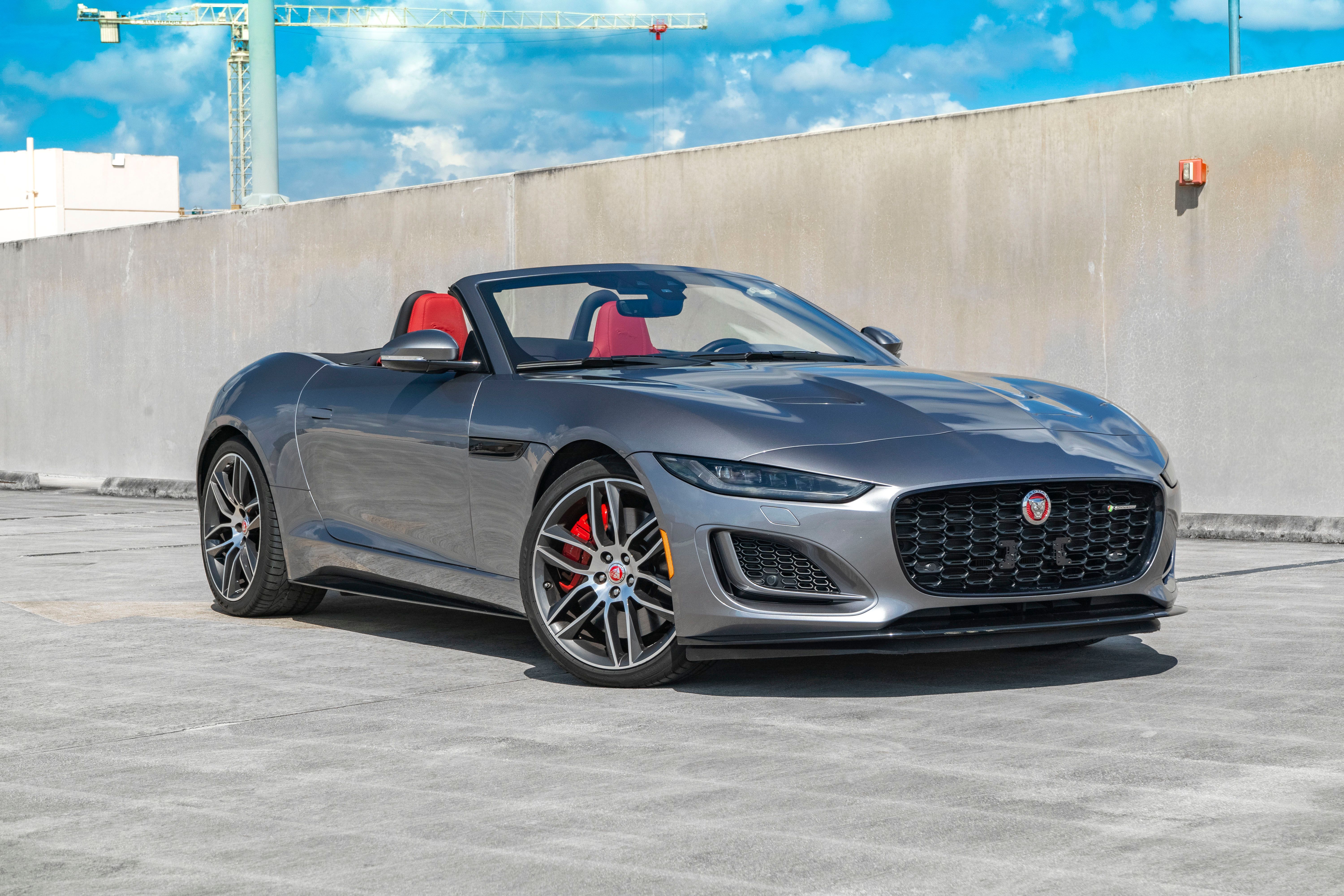 a gray Jaguar F-Type Covnertible parked