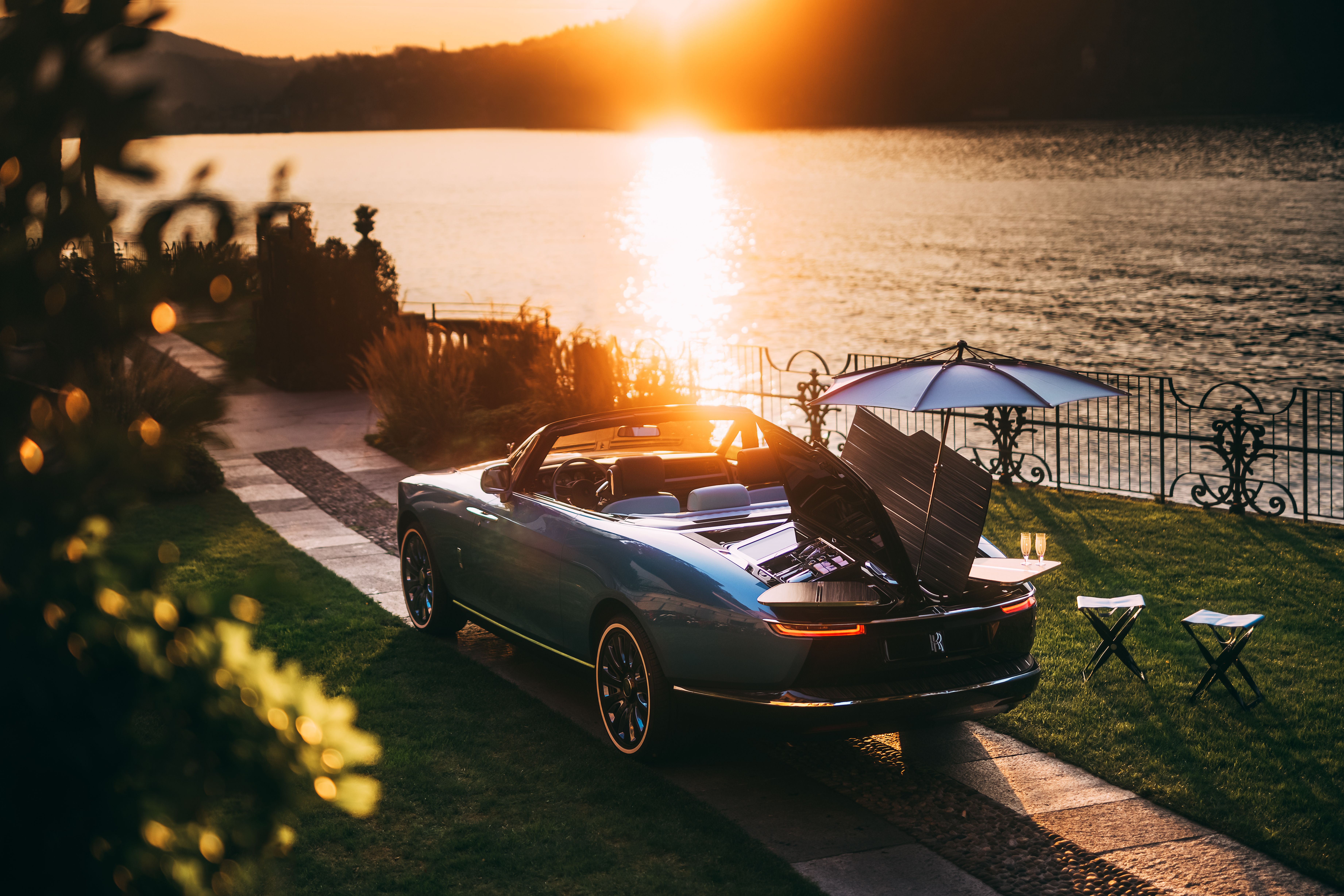 A blue Rolls Royce Boat Tail