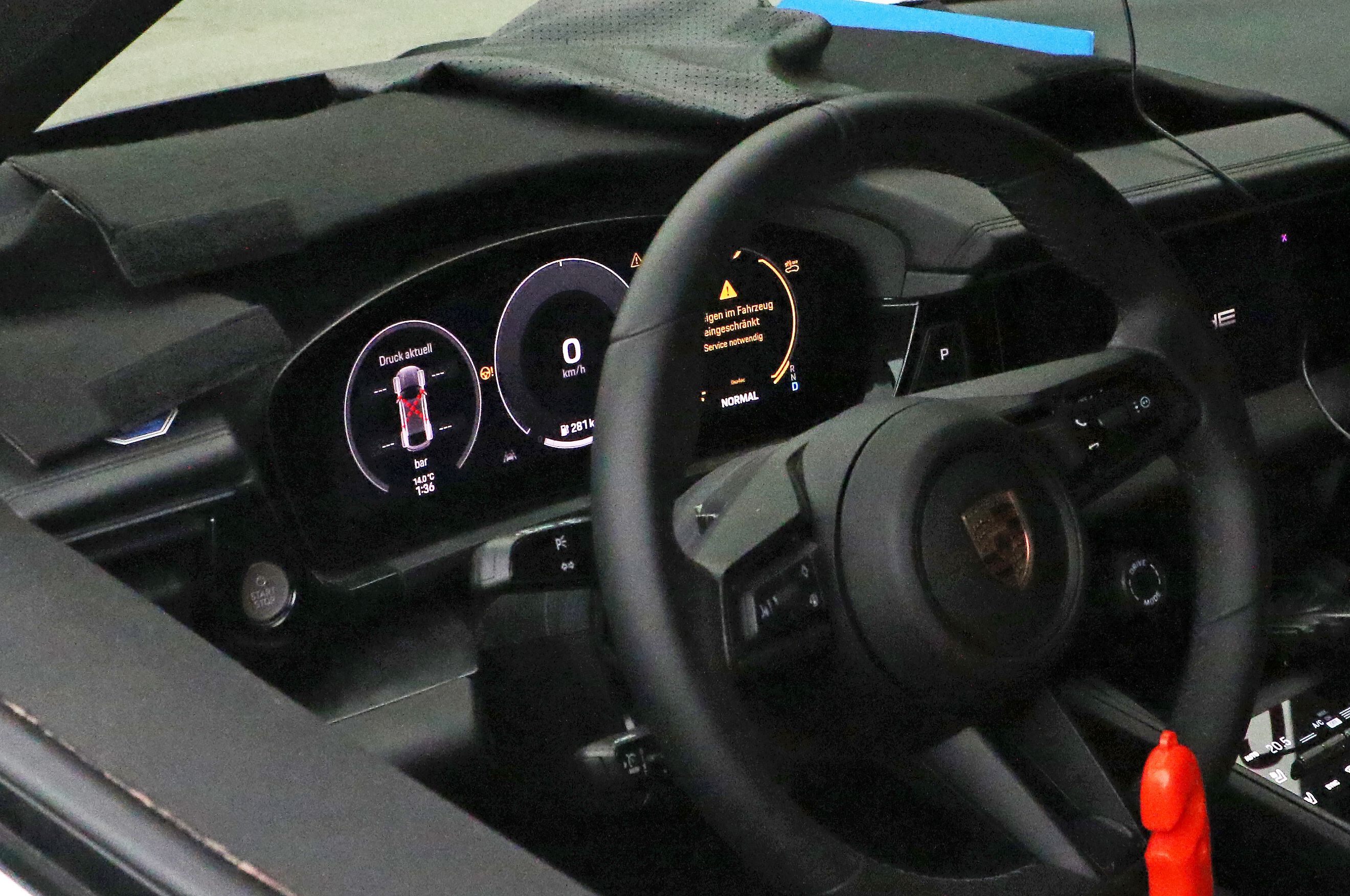 Spy Shots An Early Look at the 2024 Porsche Macan EV's Interior