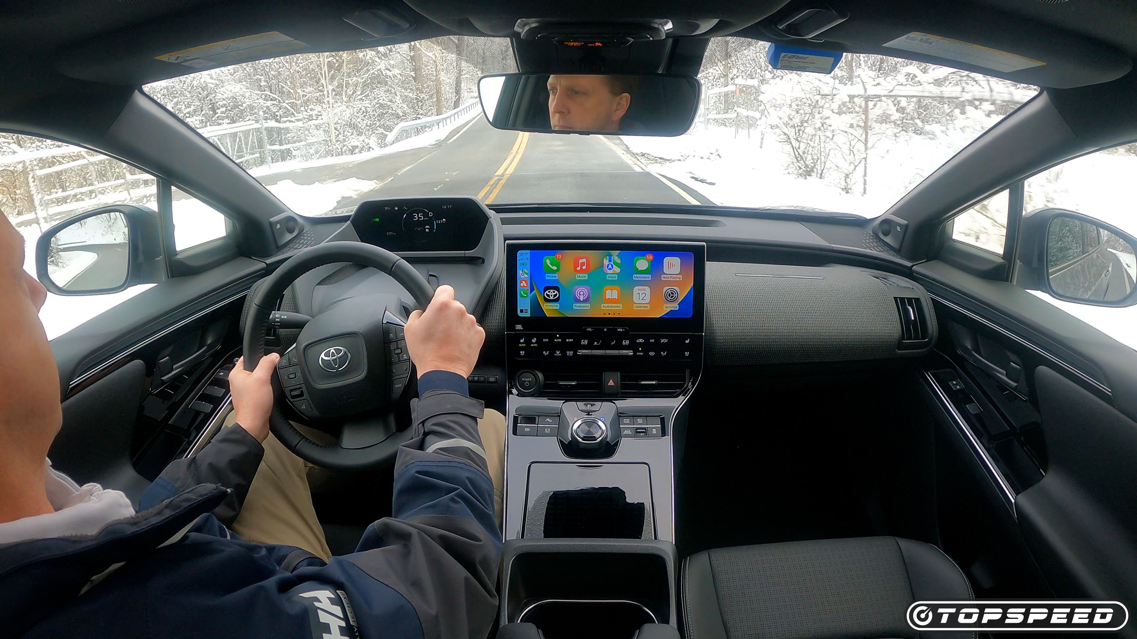interior driving snowy road bZ4X