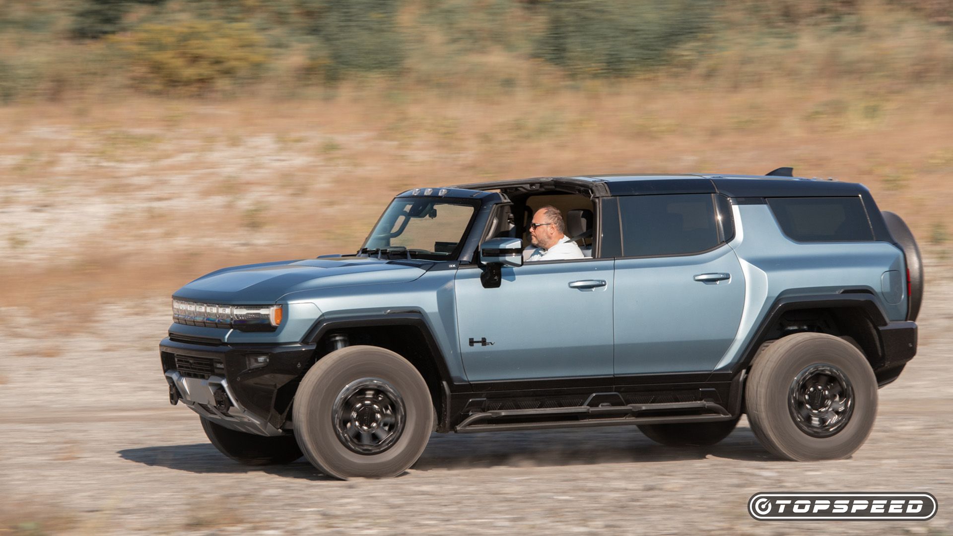 2024 GMC Hummer EV SUV Driving Side 2 TopSpeed