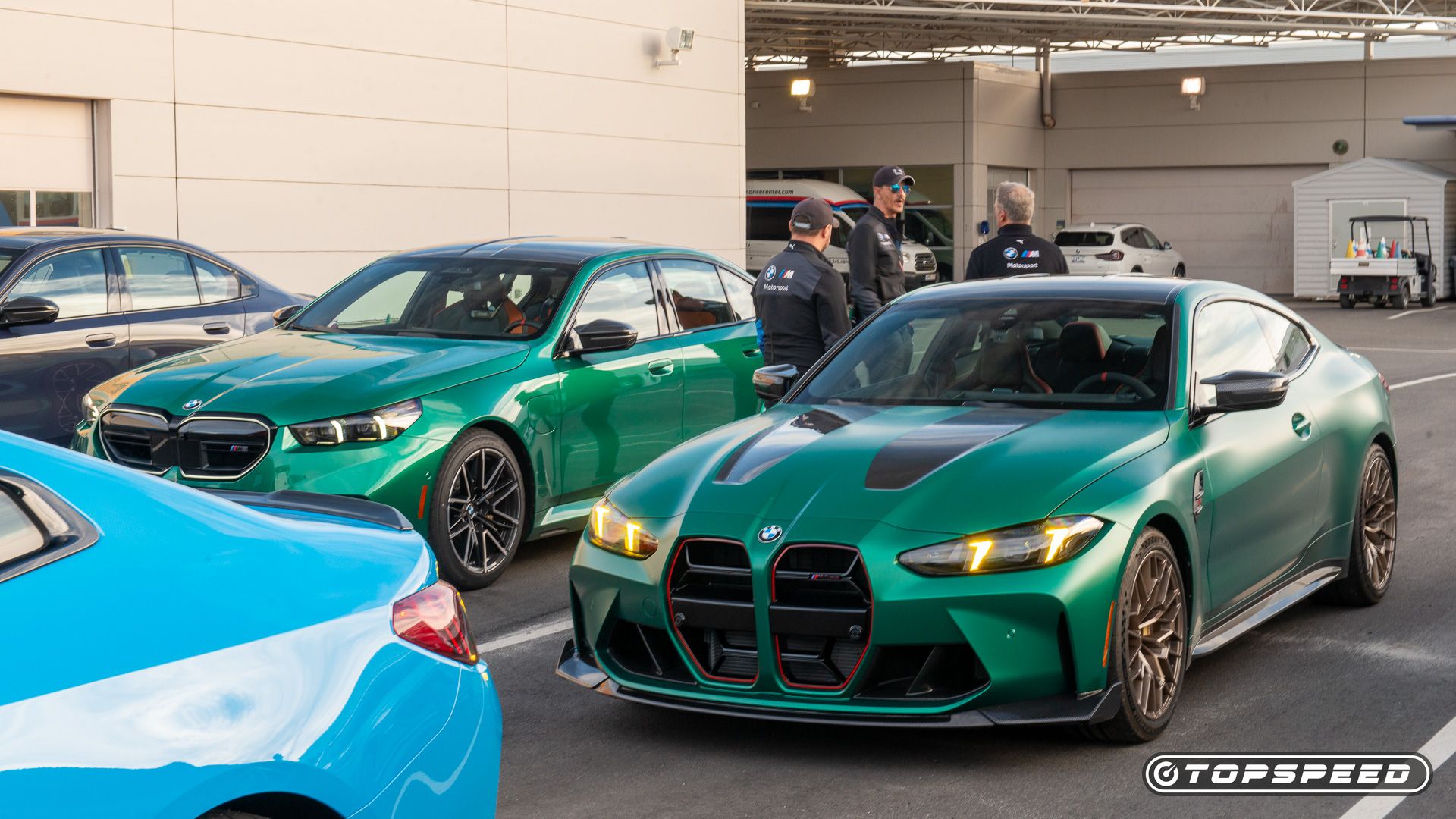 2025 BMW M4 CS next to 2025 M5 at track amee reehal