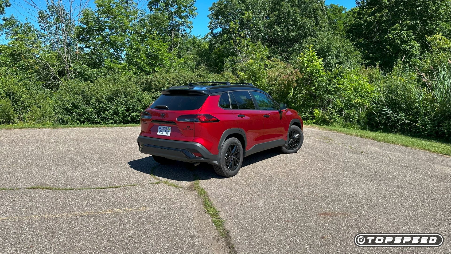 2025 Toyota Corolla Cross Hybrid Nightshade -- Rear Three-Quarter 01